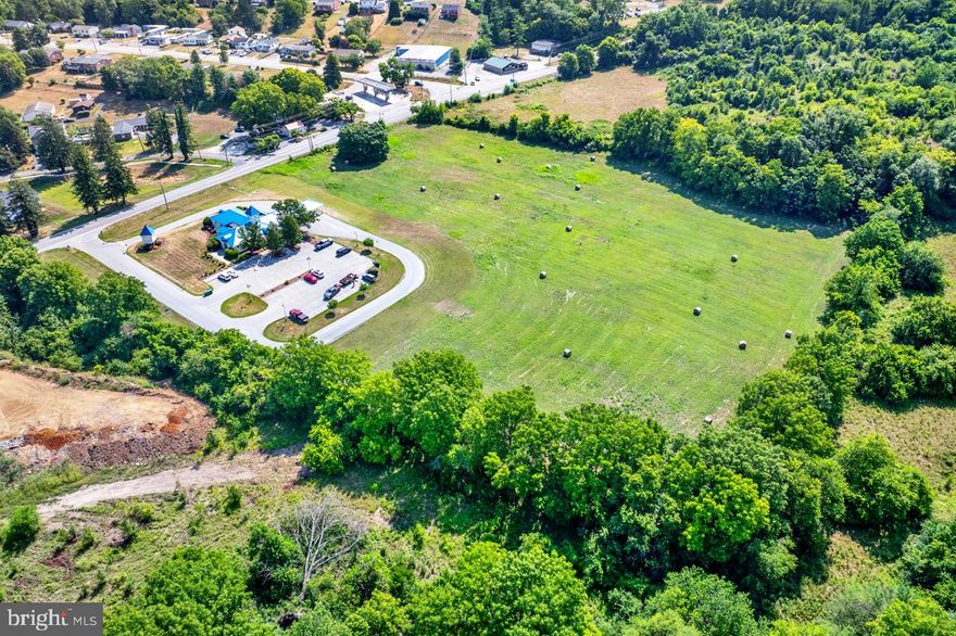 Unlock the potential of your business with this exceptional 6.33-acre commercial land lot in the heart of Charles Town, West Virginia. Strategically located with easy access to Route 340, this prime property offers unparalleled visibility and convenience, making it an ideal investment for a wide range of commercial ventures.

This versatile and open land is zoned for commercial use, suitable for a variety of business applications. Its central location in Charles Town ensures high visibility and exposure, with a high traffic count that guarantees excellent exposure for your business. The convenient access to Route 340, a major thoroughfare, adds to its appeal, making it perfect for retail, office space, hospitality, or mixed-use development.

Seize this unique opportunity to establish your business in a thriving area with robust growth potential. Whether you're looking to expand your current operations or embark on a new venture, this property offers the perfect canvas to realize your vision.