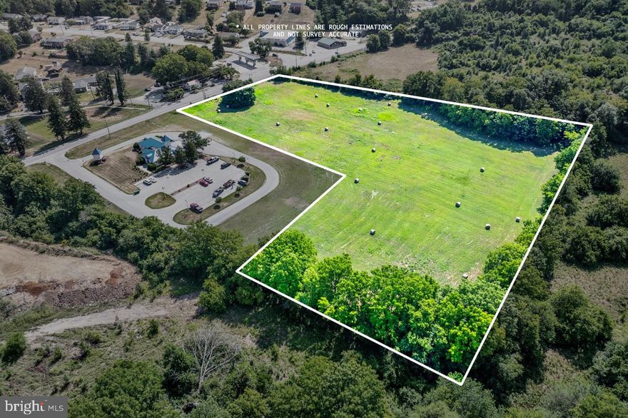 Unlock the potential of your business with this exceptional 6.33-acre commercial land lot in the heart of Charles Town, West Virginia. Strategically located with easy access to Route 340, this prime property offers unparalleled visibility and convenience, making it an ideal investment for a wide range of commercial ventures.

This versatile and open land is zoned for commercial use, suitable for a variety of business applications. Its central location in Charles Town ensures high visibility and exposure, with a high traffic count that guarantees excellent exposure for your business. The convenient access to Route 340, a major thoroughfare, adds to its appeal, making it perfect for retail, office space, hospitality, or mixed-use development.

Seize this unique opportunity to establish your business in a thriving area with robust growth potential. Whether you're looking to expand your current operations or embark on a new venture, this property offers the perfect canvas to realize your vision.