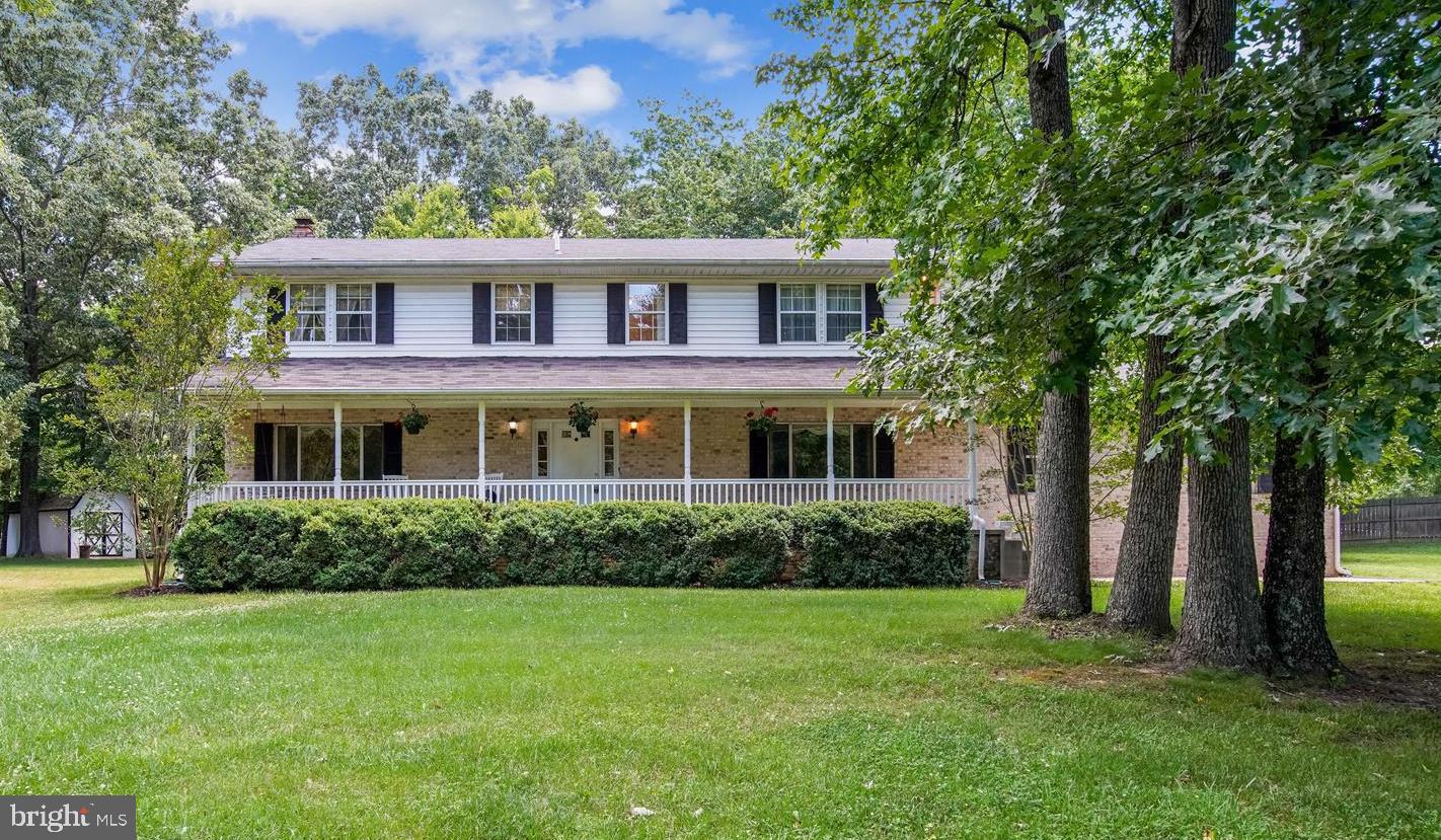 Closing Help! Decorators Allowance! 2,842 Sqft. BEAUTIFUL home on GORGEOUS Lot in a WONDERFUL neighborhood. PRICED BELOW APPRAISED VALUE. INSTANT EQUITY. Come home to the country... Snuggled on a beautifully landscaped lot, down a long black top driveway, you'll find this wonderful southern colonial. You'll love the full length front porch with that swing that you've always wanted. Inside you'll enjoy all the comforts of home: Extra wide foyer with ceramic tile, a formal dining room, living room/office/main level bedroom, a kitchen with a breakfast room, a large family room with a woodburning stove, a Florida Room that leads to the Gazebo. Keep all your toys in the huge/oversized sideload garage. Not only does this home have a Gazebo for your crab feast, its got a patio for your Bar-Be-Ques, and a yard large enough to play football in. Plant your favorite flowers then keep your garden supplies in your large storage shed. Close to everything...Less than 15 minutes from shopping, entertainment, healthcare, and school. Only 12 miles from the NSWC, 20 miles from AAFB , and less than an hour from DC. Hurry...Home is calling. Only one shed conveys. Room for a main level 5th bedroom. Breath taking lot...gives you the WOW factor. MUST SEE. PRICED BELOW APPRAISED VALUE. APPRAISAL IS LESS THAN 90 DAYS. GREAT DEAL!!! BEAUTIFUL HOME!!!