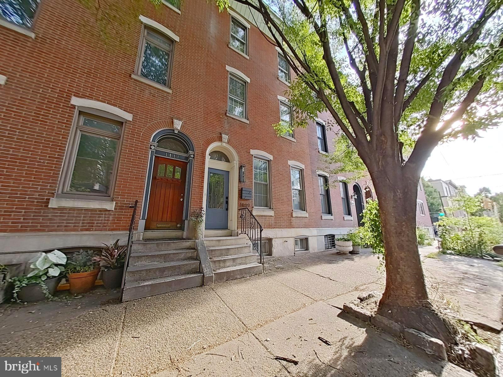 Welcome to this stunning newly renovated brick-front home, offering stylish city living in the heart of Graduate Hospital. Nestled on one of the neighborhood’s most peaceful, tree-lined blocks, this south-facing residence spans three stories plus a finished basement, delivering nearly 2,500 square feet of thoughtfully designed living space.
You are welcomed inside by an inviting foyer which leads right into the living area. The first floor features an open-concept living space that is flooded with natural light and is equipped with a faux electric fireplace and hardwood floors that flow throughout the home. A striking exposed brick wall adds warmth, charm, and classic Philadelphia character to the main level. Nestled away in between the living and dining room is a convenient half bath. The true centerpiece of the first floor is the chef’s kitchen, featuring a waterfall island and a professional-grade appliance package including a stainless steel Refrigerator, Oven Range, 6-Burner Cooktop, Dishwasher, and Built-In Microwave. There is an endless amount of cabinet and countertop space making this every chef's dream! Sliding doors lead to a private paved patio, which is ideal for hosting summer dinners or enjoying quiet mornings with coffee.
Upstairs, the second floor offers three comfortable bedrooms, a full bathroom, and a dedicated laundry room with laundry hook-up for convenience. Each bedroom is equipped with their own personal closet space for personal belongings.
The entire third floor is dedicated to a luxurious primary suite retreat, complete with a walk-in closet and a spa-like ensuite bath showcasing a soaking tub, modern vanity, stand up glass shower, and a heated towel rack. From here, step out onto the roof deck, where sweeping Philadelphia skyline views stretch from river to river, a view that you will never be able to get over.
The finished basement provides flexible bonus space for a home office, gym, or media room, along with valuable storage. The property also includes two HVAC units, a rare convenience in this area.
13-month HWA home warranty will be included with acceptable offer. This must be included in the Agreement of Sale.
With an excellent Walk Score of 94, daily errands do not require a car, and a Bike Score of 88 highlights outstanding bike-friendly infrastructure, this location is perfect for those seeking both convenience and accessibility.
Just steps from the YMCA and within walking distance to Rittenhouse Square, CHOP, Penn, Jefferson, and some of the city’s best dining and shopping, this home seamlessly blends modern upgrades with timeless Philadelphia charm. Don’t miss the opportunity to own a spacious, move-in ready residence in one of the city’s most sought-after neighborhoods.