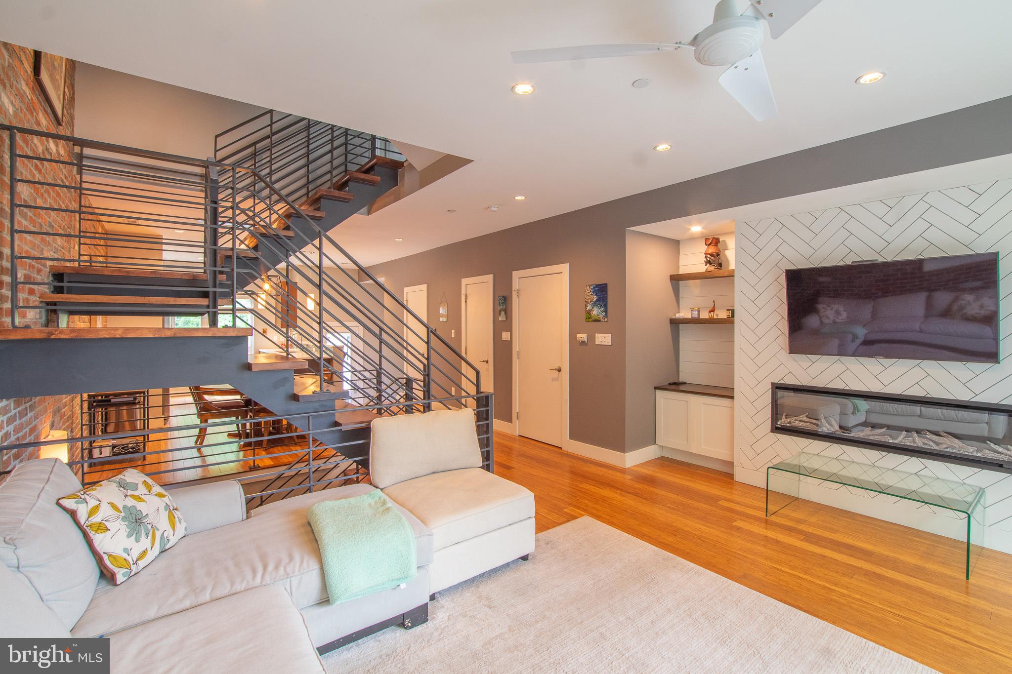 *Available 8/5!*
Welcome to 1007 S 17th Street! This is a modern home offers spacious city living with rare two-car carport parking, a private rooftop deck, and designer finishes throughout. Perfectly positioned in Graduate Hospital, this residence combines thoughtful architecture with everyday functionality across four beautifully finished levels. Inside, you’re greeted by an open-concept main floor featuring a sleek chef’s kitchen with high-gloss cabinetry, quartz countertops, subway tile backsplash, and stainless steel appliances. Floor-to-ceiling windows and wide-plank flooring give the space a bright and airy feel. A striking steel-framed floating staircase leads into the expansive living room, where a full exposed brick accent wall brings texture and charm to the modern design. Thoughtfully crafted custom built-ins surround the media area, offering both style and storage. Oversized sliding glass doors flood the space with natural light and open to a generously sized private terrace—perfect for indoor-outdoor living and entertaining. The fully finished basement offers incredible flexibility with a full bath, making it perfect for a home office, guest suite, gym, or media room. The second level includes two spacious bedrooms, a full bathroom, and a dedicated laundry room with tiled flooring, and a utility sink. The third-floor primary suite features a spa-like bathroom with a sleek double vanity and a glass-enclosed tiled shower, plus access to a wet bar just inside the door to your private rooftop deck with stunning skyline views. Smart home lighting, dual-zone Nest thermostats, a new AC compressor, and fresh paint throughout complete the home. Located just blocks from Rittenhouse Square, Schuylkill River Park, and beloved neighborhood favorites like Ultimo Coffee, Sidecar Bar, Sabrina’s, Chicks, and L’Anima. You’re also just steps from daily essentials at Sprouts, Target, and Giant, making errands and grocery runs effortless.
Lease Terms: Generally, 1st month, and 1 month security deposit due at, or prior to, lease signing. Other terms may be required by Landlord such as last month’s rent upfront. $65 application fee per applicant. Tenants are responsible for: electricity, cable/internet and $10/mo technology fee. Water is a flat monthly fee of $105. $25 service fee plus cost of the air filter will be charged quarterly for routine air filter replacement. Landlord Requirements: Applicants to make 3x the monthly rent in verifiable gross income, credit history to be considered, no evictions within the past 5 years, and must have a verifiable rental history with on-time rental payments. Exceptions to this criteria may exist under the law and will be considered. Cosigners will be considered.
*Pets Permitted; $500 Non-Refundable per Pet
*Two Covered spaces in rear carport