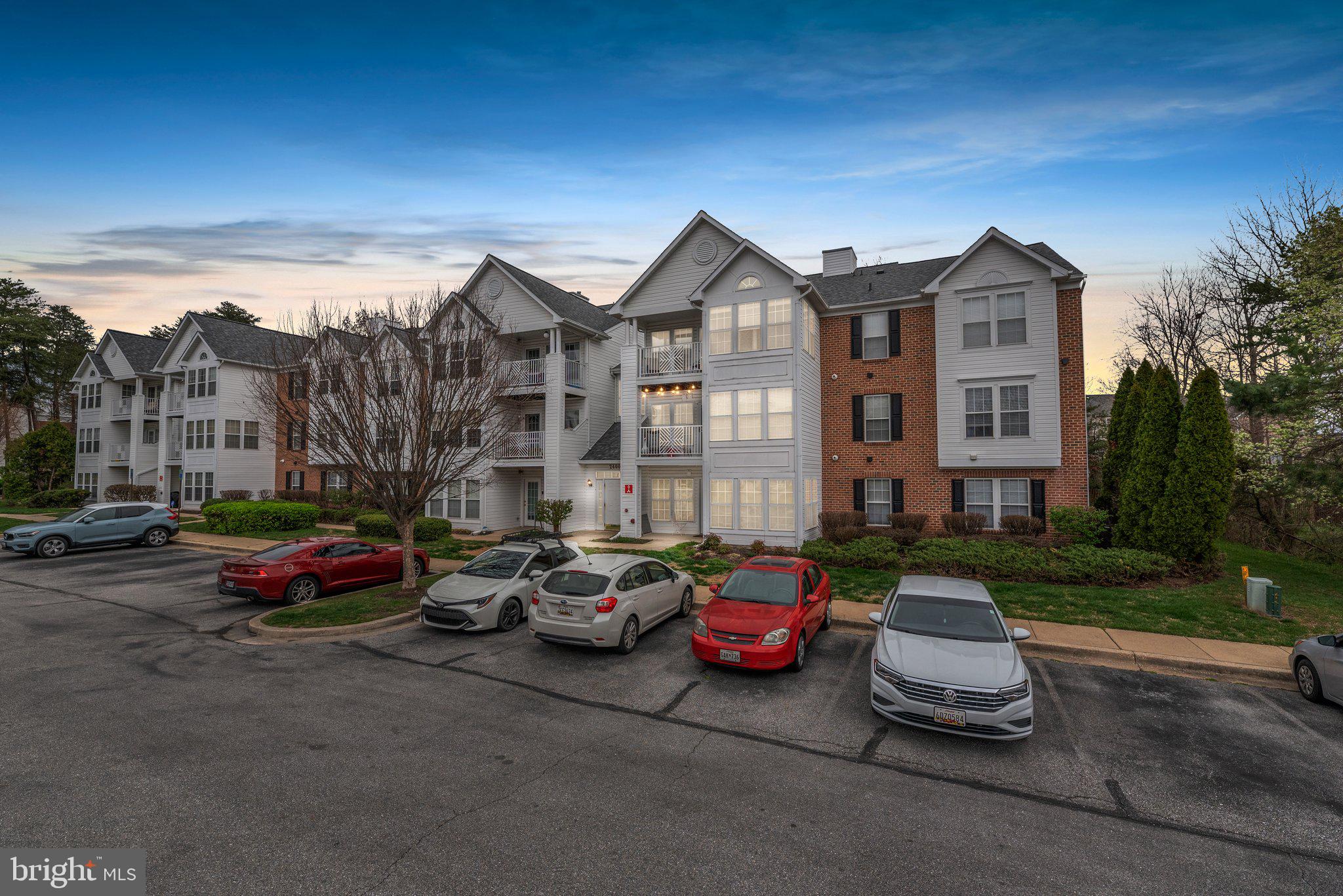 Simple living at its finest in sought after Piney Orchard! Penthouse condo boasts hardwood floors throughout, cathedral ceilings, updates and natural light. Kitchen features granite countertops, stainless steel appliances, plenty of cabinet space and a breakfast bar. Spacious living room with access to the balcony area and light filled corner office. Primary bedroom with en-suite bath! Second bedroom and second full bath. Laundry in unit! Fantastic community amenities include a clubhouse, fitness center, indoor and outdoor pools, tot lot, walking paths and tennis courts. Great commuter location close to routes 32 and 97. Near Fort Meade, shopping and restaurants. Welcome home!