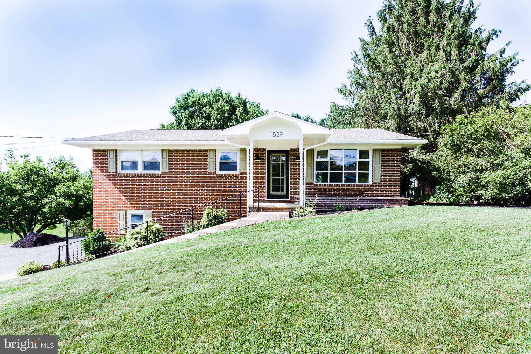 FULLY RENOVATED WITH ARTISTIC TOUCHES! This All Brick 3 bedroom 1.5 bath Raised Rancher features: updated kitchen with granite counters & new stainless steel appliances; new luxury vinyl plank & carpet through out; new modern light fixtures; updated bathrooms with granite top & new vanity; lower level family room with fireplace/woodstove; built-in bookcases; over-sized two car garage; front porch, large rear deck; storage shed; and so much more! Located in the lovely Pleasant View Development and setting on a fabulous lot with a great back yard & landscaping which includes a garden pond & landscape stone accents! NOTE: Professional Photos including interior coming soon...