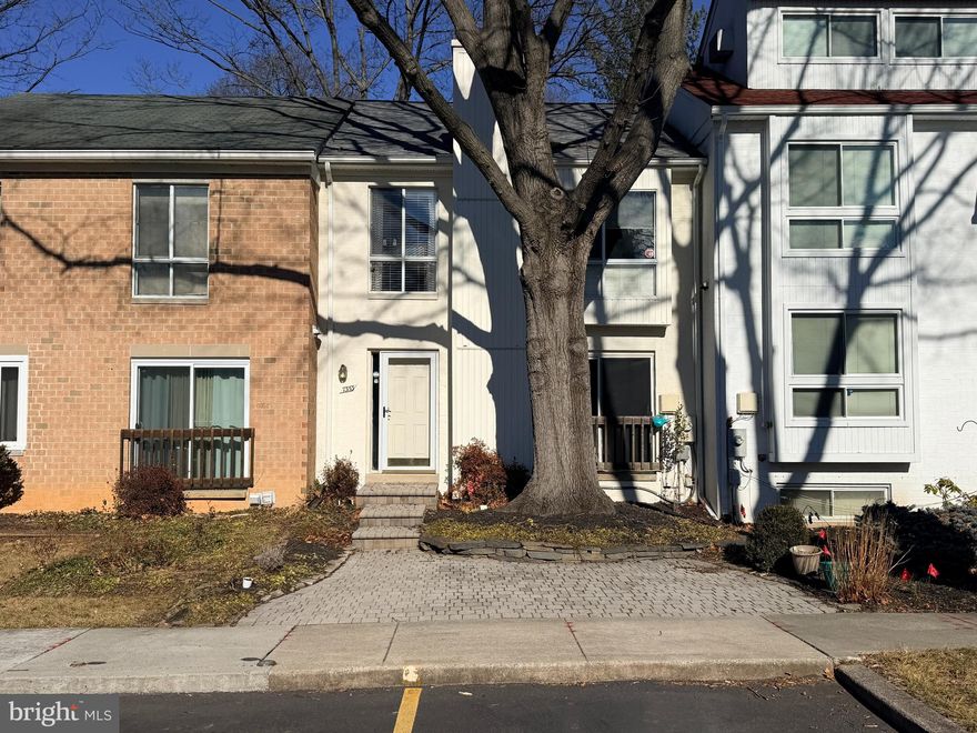 OPEN HOUSE SATURDAY FEBRUARY 7, 1-4- please stop in to see your new home!  Welcome home to 7353 Broken Staff, a beautifully updated townhome in the heart of Columbia, Maryland; truly move-in ready and thoughtfully improved over the years.  This home offers the perfect blend of comfort, functionality, and location, complete with a FENCED BACKYARD ideal for pets, play, or relaxing outdoors.  Recent updates provide peace of mind and modern appeal, including fresh paint throughout most of the home (2026), a new range (2025), two new basement sliding glass doors (2025), additional attic insulation (2023), a NEW ROOF (2022), new bedroom carpeting (2022), and NEW HEAT & AIR SYSTEM (2019).  Privacy abounds here as THE HOME BACKS TO OPEN SPACE AND TREES, offering a tranquil setting with no homes directly behind.  The main level features a welcoming kitchen with a breakfast/snack bar, adjoining dining area with a built-in curio cabinet, and a charming WOOD BURNING FIREPLACE.  Gleaming HARDWOOD FLOORS enhance the living room, where two sliding glass doors lead to a spacious deck where you can enjoy morning coffee, entertaining, al-fresco dining, and star-gazing.  Upstairs, the private owner’s suite offers a generous walk-in closet and an updated full bath.  Bedrooms two and three share the hall full bathroom, providing comfortable accommodations for family or guests.  The finished walk-out basement expands the living space with a large recreation or family room featuring custom built-in shelving, plus two brand-new sliding glass doors that open to the fenced backyard.  A full bath, utility/storage room, and convenient under-stair storage complete this area.  Outdoors, enjoy both a rear patio and storage shed, along with a front patio-ideal for added outdoor enjoyment.  Ample surface parking adds everyday convenience.  Location truly sets this home apart.  WITHIN WALKING DISTANCE are the grocery store, community pool, and county library.  Just steps or a short bike ride away, Lake Elkhorn invites outdoor enthusiasts with its two-mile walking and jogging path, playground, and picnic pavilion.  Easy access to major commuter routes places The Mall in Columbia, Town Centre, the Merriweather District, shopping, dining, and entertainment just minutes away.  Come see why Columbia, Maryland is consistently recognized as ONE OF THE BEST PLACES TO LIVE-and discover why 7353 Broken Staff is the perfect place to call home.