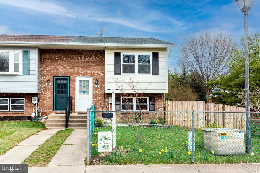 The daffodils are blooming and there is plenty of space to garden in this end unit townhome available immediately.  3BD 1BA home with kitchen appliances included.  Nice fenced rear yard with patio.  New water heater, roof, gutters, downspouts 2018/2019.  New windows 2024.  Bring your decorating ideas for this home and spruce it up inside and out this spring.