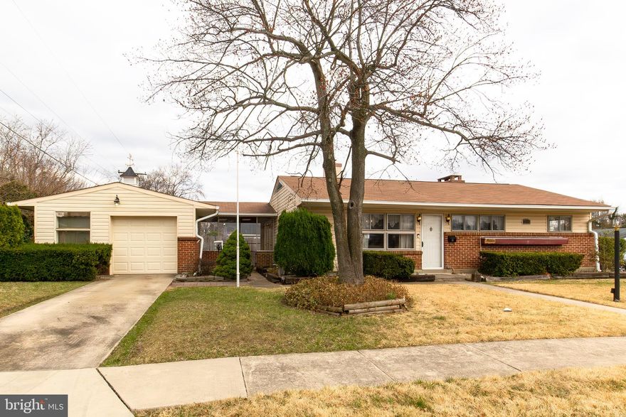 Nestled in the highly sought-after Woodcroft community in Parkville, this charming ranch-style home offers 3 bedrooms and 1.5 baths in the approximately 1,500 sq. ft. of finished living space and sits on a .17-acre corner lot. One of the standout features of this property is the breezeway that connects the house to an oversized, heated 1-car block garage, offering both convenience and additional storage. Inside, you'll find a spacious family room with a true masonry fireplace, complete with a raised brick hearth and heatilator, creating a cozy and inviting atmosphere. The home also boasts a powder room in the family room addition, adding a touch of comfort and functionality. Outside, a separate lawn shed with electricity and attic storage provides ample space for tools and equipment. With gas heat and central AC, this home offers modern amenities while retaining its classic charm. While not recently updated, this property has fantastic bones and presents a rare opportunity to own in this desirable neighborhood at a great price.