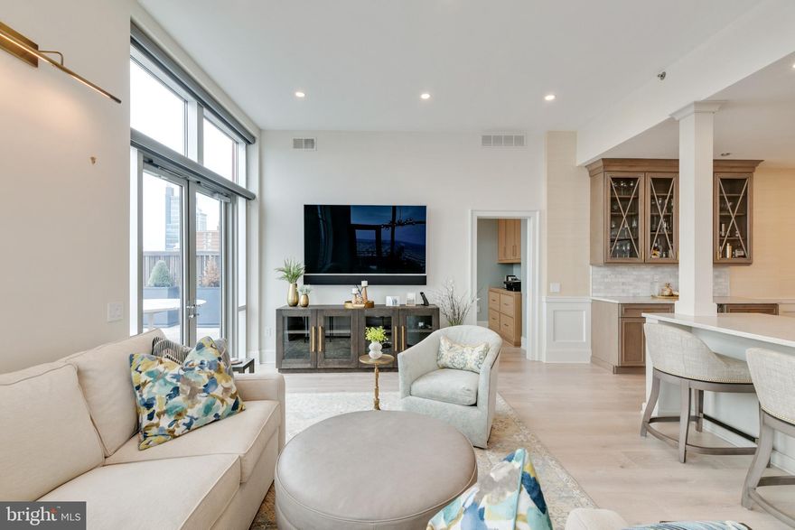 Must see, The Symphony House Condominium. This exceptional home has three private outdoor spaces. Once you enter this beautiful home you will never want to leave! As you walk into this bright, open space with an unparalleled amount of natural light and amazing views (south, west and east) from every window, all you will want to do is enjoy all the city has to offer. This home has been recently renovated and you will see all the beautiful renovations as soon as you enter your front door. The flooring is blonde, wide plank hardwood throughout the living space. As you follow the light into the wide open, renovated chefs kitchen with custom cabinetry, marble countertops, a Wolf 6 burner range you will find an abundance of storage. In addition, there is additional custom cabinetry along with a wine refrigerator. The open floor plan living room and dining room, allows for you to enjoy magnificent sunsets and to blend the indoor with the outdoor from the floor to ceiling windows that will lead you out to the first of the three terraces. This large terrace enables you to enjoy large gatherings, watching sunsets and special entertaining. There is a smaller terrace just outside the dining room for smaller gatherings. In addition, there are two office/dens for all your work-from-home business needs. Enter the first of the three bedrooms with its own en-suite full bathroom. This bedroom has three large walk-in closets and enjoy the incredible south views (also east and west). The second of the three bedrooms has its own en-suite full bathroom with a walk-in closet and incredible south views (also east and west). Finally, enter the primary suite, which has four large closets (one being a large walk-in) that have all been customized with an abundance of storage for all your needs. The master bath has been completely renovated with two separate sink areas, an extra large walk-in shower with two shower heads and a linen closet. You will also enjoy the private terrace for your relaxing and sunset watching. This terrace also faces south (west and east). You will also find an extra large laundry room with a brand new full size washer and dryer, and extra storage. This home has electronic blinds throughout, four zones of heat and air. All windows in the home open. This unit includes 2 car parking and a storage unit. The amenities at this residence are second to none. This is a luxury 32 story building with 24/7 concierge and door person. Enjoy the 65 foot heated lap pool, outdoor terrace, hot tub, steam and sauna room, fitness center, large conference/dining room, library, entertaining area, and catering kitchen. There is also a temperature controlled wine room/tasting area with storage for your collections. Enjoy being steps away from The Kimmel Center, Academy of Music, world class restaurants and all the city has to offer.