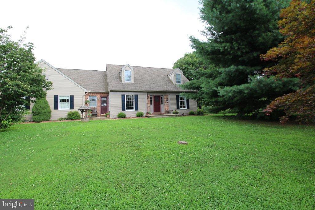 Well built and cared for Custom Cape. Open floor plan, sunroom addition. Each bedroom features its own private bath. 2 car attached garage and 1 car detached garage.