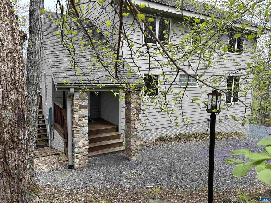 Wonderful mountain home that features SIPS technology for comfort and energy efficiency year-round. This well maintained 4 bedroom 3 bath home house offers flexible use with two gathering areas on separate floors, multiple decks w/ hot tub on lower level, an attached garage w/ added storage. This location features great seasonal views, privacy but easy access to Devils Knob golf & tennis complex, and a short walk to Chestnut Springs pool and the Shamokin Springs Nature Preserve. An active rental so check with agent for availability. Annual average gross rental revenue of $45K past two calendar years. In addition, lot 18 on Blue ridge Dr which is behind the house and adjoins 96 Wood Lily is available to purchase.,Maple Cabinets,Quartz Counter