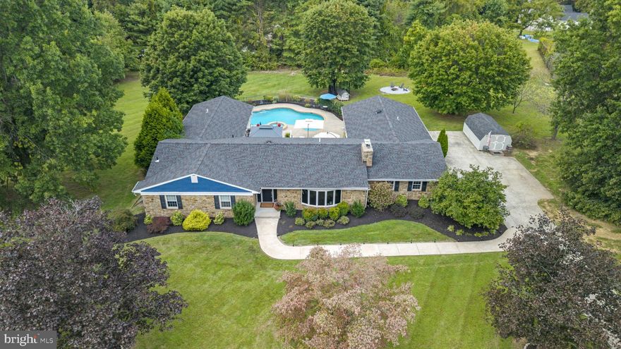 Open house is canceled! Under contract- 
Prepare to be captivated by this deceivingly expansive residence at 5 Derry Drive- a luxurious ranch-style estate nestled on a lush 2-acre lot in the heart of Glen Mills. Boasting 3,500 square feet of beautifully renovated living space—including a fully independent 2-bedroom in-law suite—and an additional 2,000 square feet in the fully finished basement, this entertainer’s dream home offers unmatched elegance, comfort, and versatility, with thoughtful, modern design and updates throughout.

2-Bedroom Fully Independent In-Law Unit
Perfect for multi-generational living or hosting long-term guests, the private in-law suite features:
2 spacious bedrooms
1.5 bathrooms
Living room, kitchen, and washer/dryer
ADA accessible/compliant design
Private entrance for complete independence and privacy

Entertainer’s Paradise
From intimate gatherings to grand celebrations, this home is designed to impress:
Sunken formal living room with an elegant floor-to-ceiling stone fireplace
Formal dining room ideal for hosting elegant dinners
Gourmet kitchen with new high-end appliances, granite countertops, and eat-in area
Expansive multi-layer deck perfect for outdoor entertaining
Heated inground saltwater/chlorine pool (your choice) and jacuzzi, surrounded by professionally landscaped grounds

Spa-Like Primary Suite
Retreat to your completely renovated master wing, featuring:
A spa-inspired bathroom with triple-sized dual showers, dual vanities, heated floors, and luxurious high-end fixtures
Low taxes for added affordability

Outdoor Retreat
The backyard is a true haven for relaxation and recreation, featuring:
A large yard with ample space for kids to play
Mature shading trees offering natural beauty and comfort
A cozy firepit perfect for evening gatherings
A chicken coop and run for hobby farming or fresh eggs

Versatile Finished Basement
The 2,000 sq ft lower level offers:
Lower-level family room
A second elegant stone-surround wood-burning fireplace
Home gym
Office
Bar area
Bonus bedroom
Powder room
Laundry room
Generous storage space

A rare find in Glen Mills- this bucolic beauty is truly in a class of its own and ready to welcome you home just in time for the holidays!