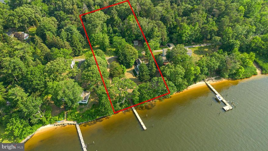 Bring your vision!! DREAM waterfront opportunity on two acres with sweeping views of the Magothy River. This flat and expansive lot offers the ultimate privacy, serenity, and potential. Endless possibilities, breathtaking waterfront views, and a premier location combine to make this a once-in-a-generation chance to own an extraordinary property. 
**No access to interior of the home until agreed upon contract, value is in the land.**
Schedule your tour today!