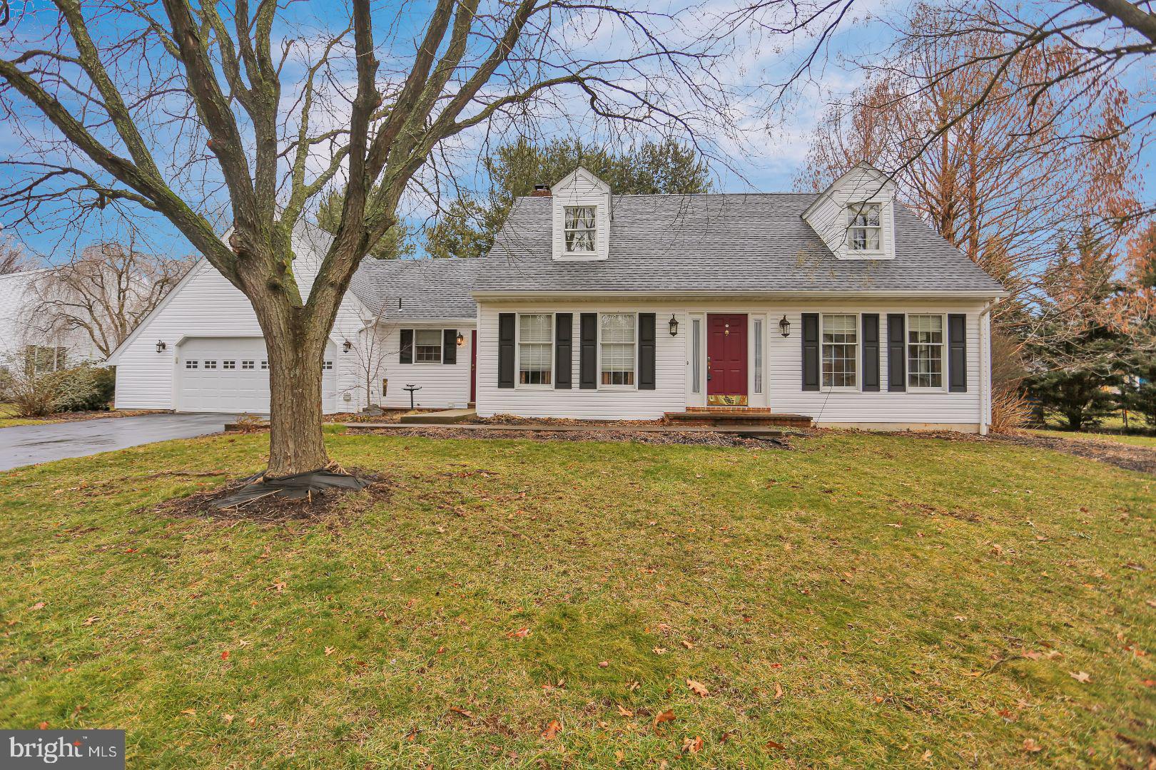 Graciously nestled in the hills of Wyomissing, this comfortable Cape Cod home offers over 3500 square feet of finished living space on three levels.  A formal living room with crown molding, chair rail and French doors is located on one side of the foyer and the formal dining room with hardwood flooring, chair rail, crown molding and a double set of French doors is located on the other side.  A family room with hardwood flooring and a double sided, wood burning fireplace, has patio doors to the screened in patio.  The eat-in kitchen offers a cozy place to enjoy the other side of the fireplace, a center island with granite counter tops and nice, wood cabinetry.  A first-floor bedroom and full bathroom with some handicap accessories make this a very versatile home.  A master bedroom and full bathroom upstairs plus two more bedrooms and a third full bathroom offers a multi-generational option for this residence.  There is an access door from the 2nd bedroom to a finished room over the garage for a studio or storage.  The lower level is finished into three rooms.  There is a large room for a recreational area and two separate rooms with flexible use to meet your needs.  The lower level consists of over 1000 Sq ft of finished living space.  The two car attached garage has new garage doors, the roof  was replaced in 2014 and the siding were replaced in 2017. There are new outside lighting fixtures and the HVAC system was also recently replaced.  A security system and radon remediation system are in place.  Seller will provide the buyer with a one year HMS warranty with an acceptable agreement of sale.