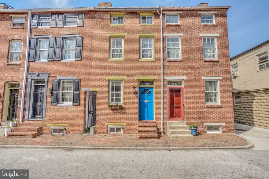 Wonderful home located in the hear to the Federal Hill historic district. Circa 1850, this home maintains original character while blending many new modern updates. You'll  love the wonderful living room and dining room, the deocrative wood stove,exposed brick,  newly renovated white kitchen with luxury vinyl tile flooring and rear deck for your summer bbqs or socially distanced dinners! The 2nd floor as a freshly updated bathroom, laundry and bedroom with decorative firepalce. The owner's suite emcompasses the third floor with room for a bedroom and an office or sitting room. There is some much to love about this sweet home. Make your appointment today!