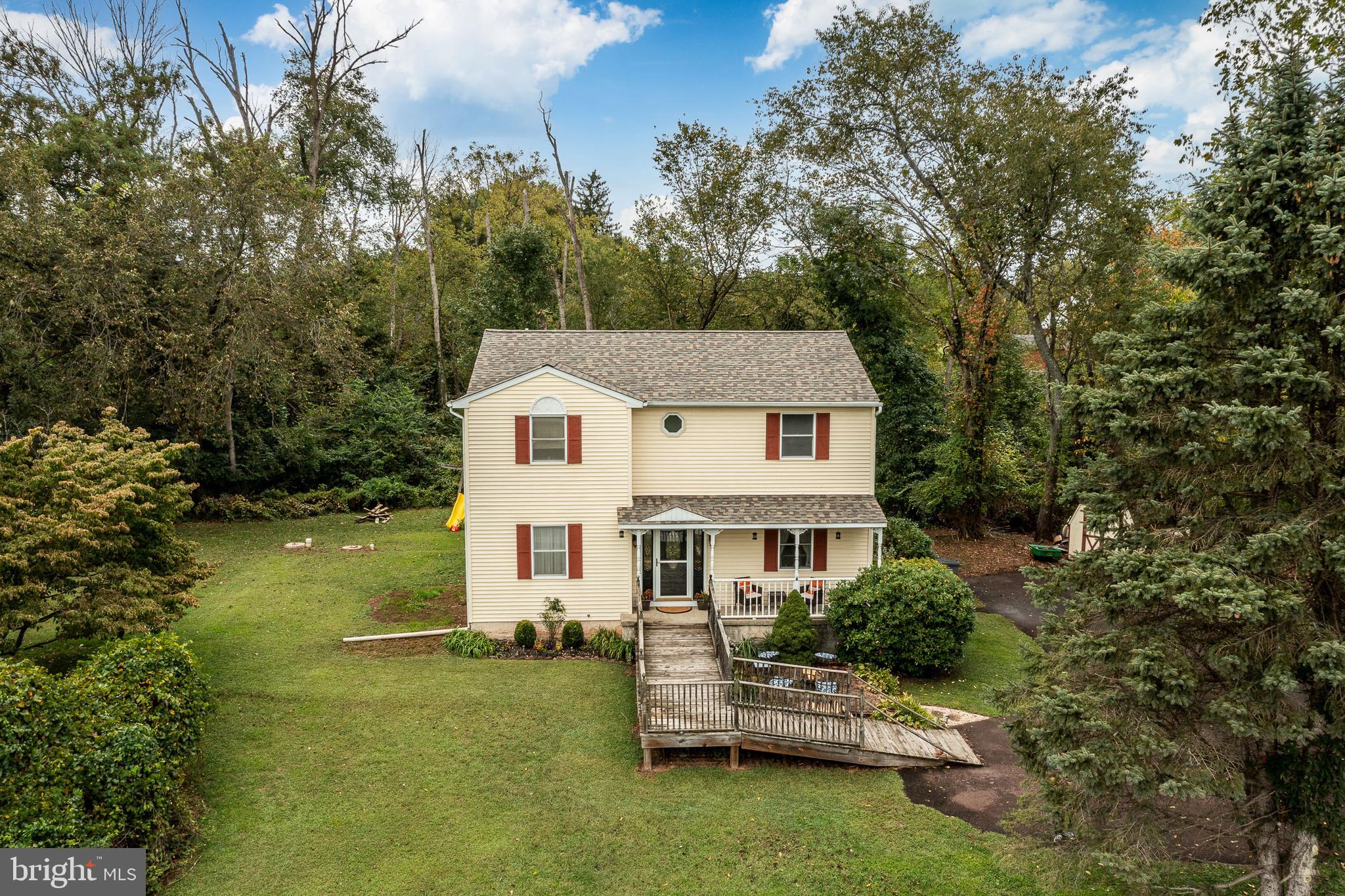 Welcome home to 330 Sanatoga Road located in beautiful East Coventry Township. From the moment you turn into the isolated driveway, all the stress of the day fades away. This home is situated on 2 acres with the quiet sounds of nature surrounding you. Enter thru the front door and you are welcomed by two great rooms on either side. One of the rooms can easily be converted into a dining room with easy access to the generously sized eat-in kitchen with a large peninsula, stainless steel appliances and an exit to the driveway. The second level of this home features the main bedroom with its own full private bath, vanity area, and two spacious walk-in closets. Off of the main bedroom is a small deck that overlooks the sprawling tree line. There are two additional bedrooms, both with spacious closets. The full hall bath and two linen closets complete this level. The lower level is partially finished and features the laundry area. A new roof was installed in August of 2024 and the home has a full house generator. This quiet country setting is steps away from the Schuylkill River Trail with close access to Routes 724, 100 and 422. On a cool night, light up the firepit, set up a tent for a camp out or wait for a family of deer to greet you. Make your appointment today to view this gem and make your own memories that will last a lifetime.