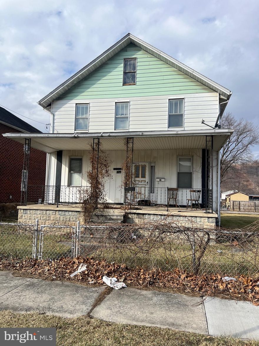 This property needs some work but could be turned into a profitable rental property or also be a large single family dwelling. Large level yard