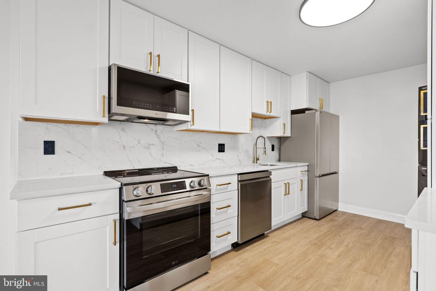 Fully renovated Montebello luxury condo with a million-dollar view for less than $400k.  Why commute when you could own a high-end condo in a resort style community in the heart of Alexandria that has so much to offer?  Walk or take the free shuttle to the Huntington Metro station.  Freshly renovated in 2026 with all new LVP flooring, brand new kitchen, new bathroom, and washer/dryer in unit.  The kitchen has been updated with new shaker white cabinets with quartz countertops and backsplash and brand new stainless-steel appliances.  The spa-like bathroom is equipped with new tile floors, walk in shower with glass slider door, new sink/vanity, light up mirror, and gold accents.  The community is safe and secure with the 24-hour security gate.  Long list of amenities includes indoor and outdoor pools, fitness center, on site convenience store, community center, basketball and tennis courts, EV chargers, grills and picnic areas, playgrounds, walking trails, dog park, salon, sauna, bowling alley.  There's nothing left to do but move in.