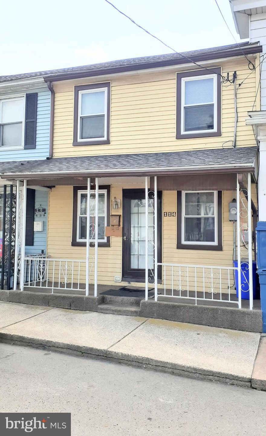 Interior row in downtown St Clair with concrete front porch.  First floor has a good size living room and a full bath and kitchen.  Second floor consists of a front bedroom with generous closet space and another full bath.
There is another small room which could be a computer room or office .  The roof is approximately          6     years old and the windows are vinyl replacement also done at same time roof was replaced.   200 amp electrical service also updated at that time .  Laundry space is in the kitchen.