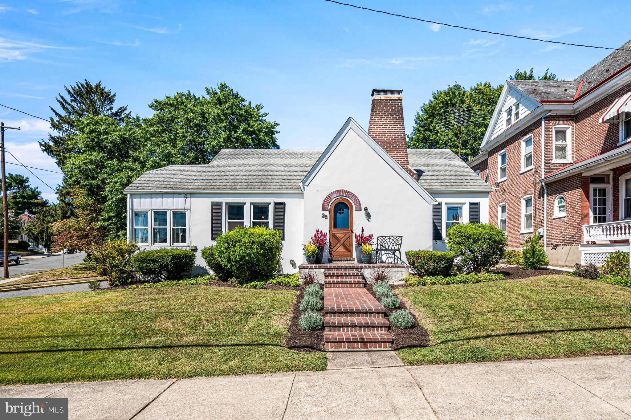 Located on one of the most picturesque streets in Boyertown, this inviting cape cod is rich in character and charm. The timeless architecture, beautiful curb appeal, and warm, welcoming interior create an atmosphere that immediately feels like home. Greet guests along a brick walkway leading to a vintage arched door entry. The main level features a spacious living Room with handsome brick fireplace, bright sun room side entry with colored interior glass transom, and charming kitchen and dining rooms. The Primary bedroom and full, beautifully renovated bathroom with high wainscoting, marble top vanity, and tilework tub/shower enclosure are also located on the ground floor. The second level features 2 additional bedrooms; one is a walkthrough and features a unique modern cable and wood railing. Gleaming wood flooring and period arched doorway openings are found throughout the updated home. Replacement windows, 200 Amp electrical service. Enjoy outdoor entertaining and recreation in the level backyard, and back porch area. The detached one car garage also features a large second porch – perfect for hanging out with friends. The unbeatable central location affords easy access to all that the great town of Boyertown has to offer: unique stores, cool eateries and coffee shops, an historic movie theater, community library, parks, upscale fruit market, Museum of Historic Vehicles and the ever-popular Colebrookdale tourist train line. Be sure not to miss this special Boyertown home.