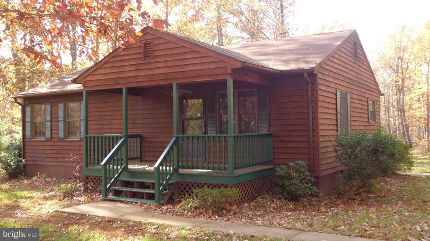 Adorable 2 Bedroom, 2 Bath Cedar Siding Rambler on 1.57 Acre Lot.  Huge 2 Car Detached Garage.