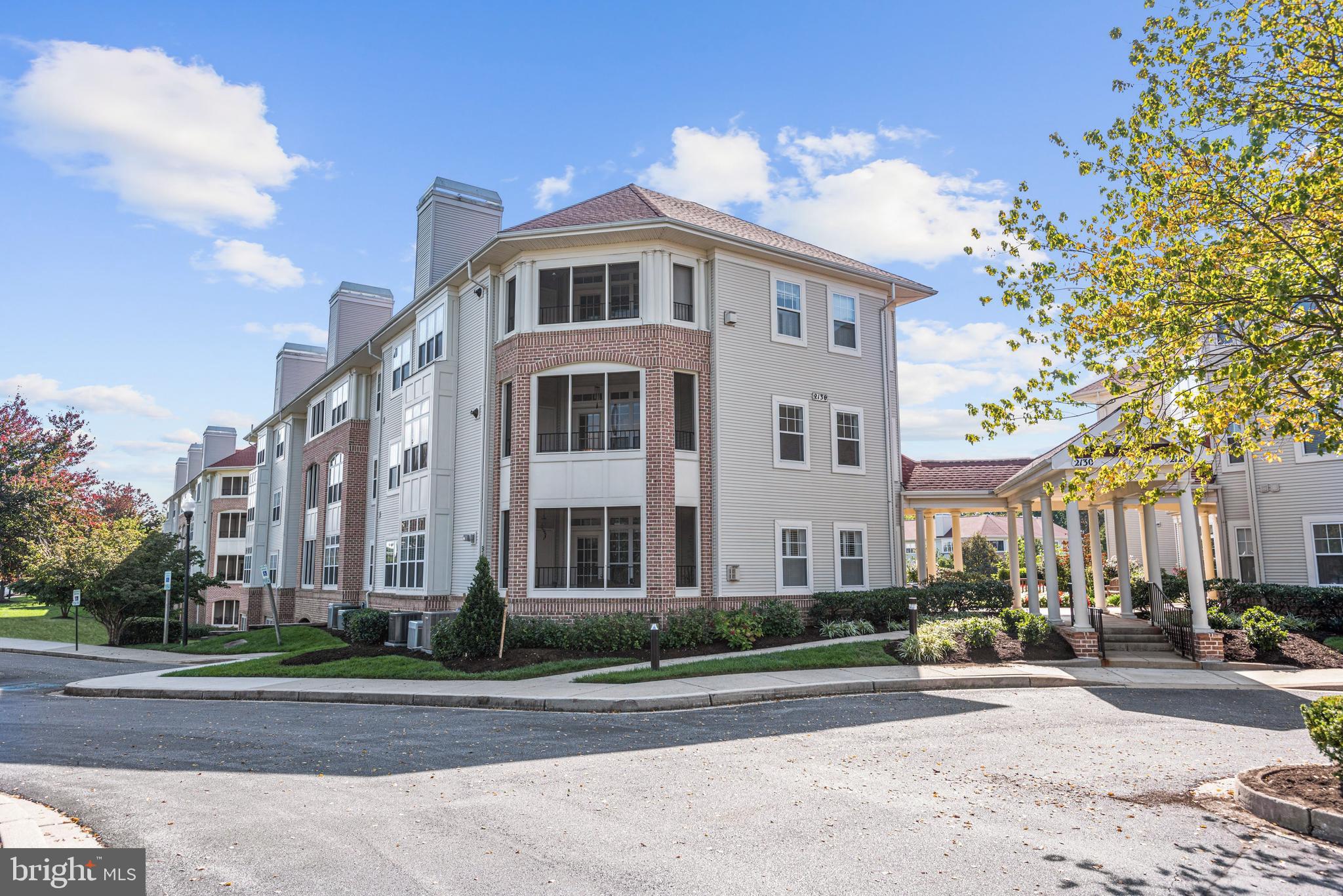 Gorgeous 2BD, 2BA & den condominium located in a secure entry building in the coveted Village Greens of Waverly Woods! Separately deeded single 1 car garage (#18) and storage unit included! Offering an exceptional open floor plan, freshly painted interiors, newly installed plush carpeting, tastefully updated kitchen, crown molding, tray ceiling, and sun drenched interiors. Graciously sized living and dining room ideal for entertaining family and friends! Stunning kitchen highlights granite counters, energy efficient stainless steel appliances, gas cooking, sleek tile backsplash, and 42in cabinetry. Retreat to the inviting den or optional 3rd bedroom to partake in your favorite novel or just to relax and unwind. Large primary bedroom offers a walk-in closet and an en suite bath complemented with dual vanities with granite counters and an inviting soaking tub. One additional bedroom, full bath and a laundry room with a full sized washer and dryer conclude the inside of this masterfully designed home. Enjoy the evening breeze from the comfort of the inviting screened porch boasting an additional storage space. The community pool and shopping center are only a short stroll away. Dont miss out on this amazing opportunity!