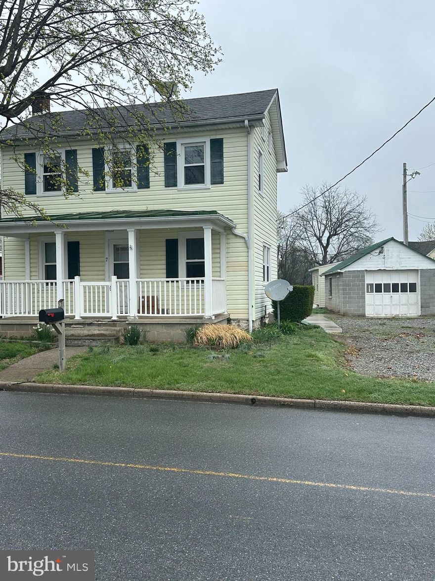 Charming Mixed-Use Property in the Heart of Thurmont!
Welcome to 7 East Moser Road—a sweet blend of old-school charm and small-town opportunity. This 3-bedroom, 1.5-bath home sits on a spacious .46-acre lot and is zoned Village Center (VC), which means it’s perfect for someone looking to live and work in one place or explore a small business venture (with town approval, of course).
You'll love the beautiful front porch, perfect for morning coffee or unwinding after a long day. Out back, there's a solid concrete patio that’s made for BBQs, entertaining, or just soaking up some sunshine. Along with a garage, there's also a separate outbuilding offering extra room for storage, creative space, or workshop potential.
Whether you're dreaming of opening a cozy shop, starting a home-based business, or just settling into a place with a little extra flexibility, this spot is full of potential—and charm. All tucked into a great Thurmont location close to town, parks, and more.