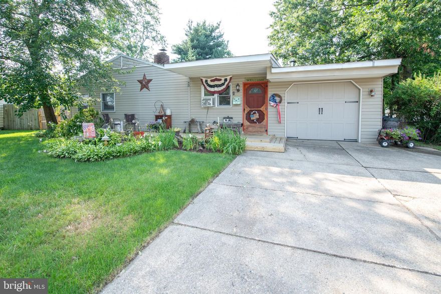 Nestled in idyllic Birch Valley, this expanded 3BR/1BA ranch on a beautiful, flat lot, offers a great retreat from the day's activities.  As you amble up the driveway you are met by an meticulously landscaped front yard and new wood patio area ideal for morning coffee or relaxing after work.  Inside you are greeted by the a wonderfully open first living room as the old carport space was finished and converted. Notice the stunning exposed beams, gorgeous floors and wainscotting on the walls.  Flanking to your left you walk into a large, inviting kitchen, with beautiful wood cabinets, oodles of countertop space, tile floors  and farmhouse sink.  To the left of the kitchen area is the original living room with continuation of the gorgeous floors and offering  a second place to relax.  Down the hall you are met by three bedrooms with great storage/closet space and an amply sized bathroom with tile floors and a rustic vanity.  Off the first living room is a spacious covered porch with  still ample yard to spare.