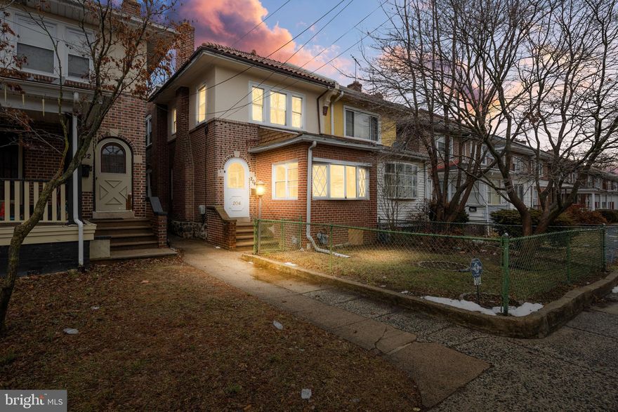 Welcome to 204 East 21st Street, Chester, PA – where charm meets modern convenience in a delightful waltz of style and comfort! This 3-bedroom, 1.5-bathroom home is a treasure trove of original features with contemporary updates, offering a generous 1,514 square feet of living space on a 2,370-square-foot lot.

Step through the whimsical curved front door, and you'll be greeted by original hardwood floors with intricate inlay that whisper tales of yesteryear. In the living room, cozy up by the gas fireplace with its classic brick surround, perfect for those evenings when you want to channel your inner bookworm or simply enjoy a good chat.

The sunroom at the front of the house is your personal slice of serenity – ideal for morning coffee, afternoon reads, or stargazing without the chill.  The formal dining area provides the perfect setting for hosting dinners or simply savoring a meal with a bit of flair. The new kitchen is a culinary delight, featuring sleek granite countertops, a stylish tile backsplash, and a stainless steel appliance package that might just inspire your inner chef to try that recipe you've been eyeing.

Upstairs features three well sized bedrooms and the full bathroom. Each bedroom offers ample closet space, ensuring your wardrobe has the room it deserves.  

Descend to the finished basement, where you'll find additional storage aplenty, a convenient half bath, and a laundry room that makes chores a breeze. Plus, there's direct access to the outside, where a fenced yard awaits your outdoor ambitions – be it gardening, grilling, or just soaking up some sun.

204 East 21st Street is more than a house; it's a home ready to write the next chapter of your life. Don't miss your chance to claim this Chester charmer as your own!