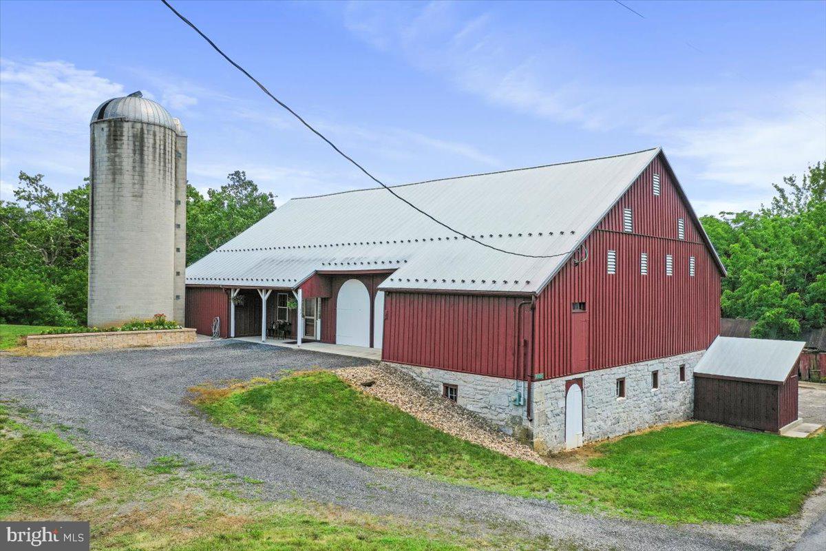 Restored 1850's Bank Barn on Conococheague Creek — Historic Charm Meets Modern Luxury!
Welcome to a truly rare find — a circa 1850 bank barn, lovingly restored by a renowned historic preservationist. This one-of-a-kind home blends rich history with exceptional modern updates, all set on a serene parcel with over 350 feet of Conococheague Creek frontage and situated on 4.7 Acres.
🛠️ Property Highlights:
Restoration completed in 2024.
On the National Register of Historic Places as a contributing building, but this does not place any restrictions on the buildings.
Original charm preserved with pine interior walls and 1" solid oak flooring
New Galvalume standing seam metal roof for long-lasting durability
14-foot ceilings and spacious open layout
Custom kitchen with large island — perfect for gatherings
4 bedrooms and 3 full baths, including a luxury master suite with walk-in custom tile shower
Expansive unfinished upper level with potential for more living or studio space
Ground-level lower floor includes substantial storage space.
Approx. 1,800 sq. ft. of open unfinished main space — currently used ass a gym, workshop, and play area
🌿 Outdoor Features:
350+ ft. of private Conococheague Creek frontage
Launch your canoe or kayak, fish, or relax by the water
Scenic picnic spots with peaceful views of the creek
Historic corn crib doubles as a storage for vehicles and equipment
Lots of Parking
📍 This unique property offers timeless craftsmanship, modern comfort, and the peaceful beauty of creek side living — all just waiting for the right owner to enjoy.
📞 Don’t miss this rare opportunity — schedule your private showing today!