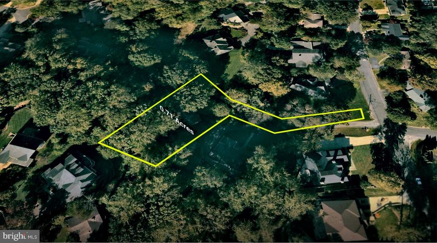 Nestled away from the street, down a private, wooded drive in Bethesda's esteemed Bannockburn Estates, lies a unique 0.71-acre lot. This buildable parcel offers unparalleled privacy, presenting a rare chance to create a spectacular custom home in a neighborhood where demand is a perennial driving force. With easy access to River Road, Clara Barton Parkway, and the Beltway, the lot is already connected to public utilities and belongs to the highly rated Whitman school cluster. A rare and in demand opportunity in one of the Capital Region's most coveted locations.