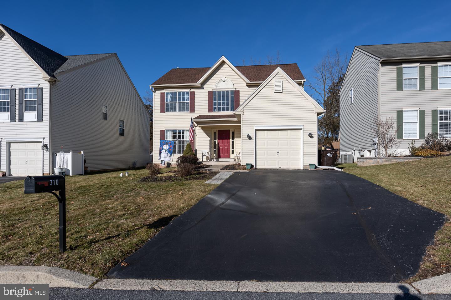 Welcome to 310 Ross Lane, a 3 bedroom 2.5 bath colonial in the community of Perkiomen Greene in the desirable setting of Collegeville.  A grand 2-story foyer welcomes you into the home. Natural light and a warm paint hue instantly set the comfortable feeling of home. To the left you will find the sitting/formal living room. The floor plan then transitions right into the formal dining room and then onto the eat-in kitchen, situated at the rear of the home. The kitchen holds ample counter space and storage. A great room feeling, the kitchen connects in an open concept to the family room. The family room holds a fireplace focal feature and is the ideal place to unwind. The second story of the home holds the three bedrooms including an owner's suite with a private ensuite, as well as two additional bedrooms that share the use of a full hall bath. From the primary floors of living you can find more square footage and room to grow in the unfinished basement. Truly a blank canvas this space is ready to be finished to fit any capacity of use you need. Outdoors you will find a spacious Trex deck that overlooks the lot that is backed by a wooded grove. Ross Lane is located central to many major routes, public transportation, and a quick commute into Philadelphia, New Jersey, and Delaware.