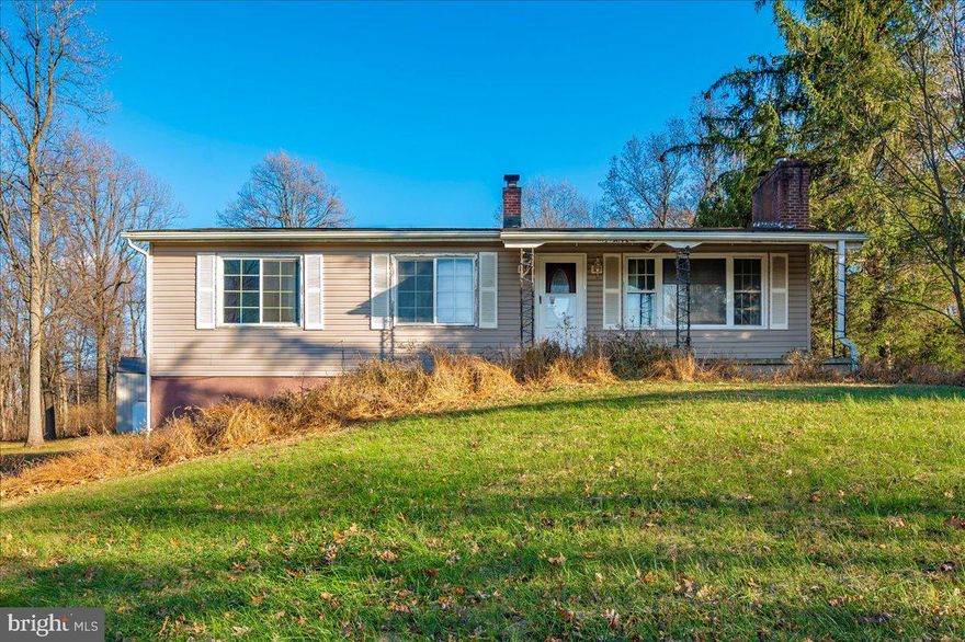 Bring Your Vision! This three-bedroom, one-bath rancher sits on nearly an acre and offers endless potential. Inside, you'll find an eat-in kitchen, a comfortable living room, and an unfinished walkout basement ready for your ideas. A spacious 30x40 detached garage with workshop space provides ample room for vehicles, tools, or hobbies. Tucked away on a quiet, tree-lined street, this property is ideal for anyone seeking a winter project or looking for sweat equity.