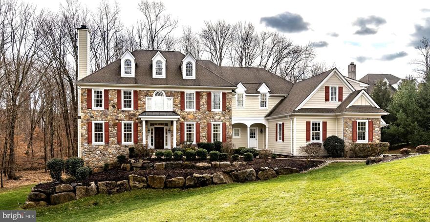 Welcome to Brick House Farm, the original model home for this fantastic community in Edgmont Township. Immaculate, stately stone and Hardi Plank home sitting on nearly an acre of ground with tons of hardscaping, paver walkways and aproned entrance. Five bedrooms, 4 full bathrooms and 2 powder rooms complete with finished walk out lower level. Enter into the grand front to back foyer with arched openings, finished with crown molding and wainscoting. The living room has crown molding, gas fireplace with travertine surround. Double French doors open to the large office with built-ins, recessed lighting, crown molding and chair rail. The formal dining room has a gorgeous built in to display your serving pieces. This room also has crown molding and chair rail. A butlers pantry loaded with sink, dishwasher and plenty of extra cabinet space. The gorgeous gourmet kitchen boasts 10 foot coffered ceilings with recessed lighting. Plenty of cabinets topped with glass fronts, granite counter tops. Stainless steel appliances with Sub Zero refrigerator. The large bright breakfast room seats at least 10 people. Sliding glass doors lead you to the oversized composite deck. The family room has high vaulted ceilings, stone fireplace with barnwood beam, a custom built in for TV and components and plenty of natural light from the back wall of windows. The mudroom, flex room/2nd office and pantry are also on the main floor as well as a second powder room. Really cool brick flooring built in cubbies with another large closet completes the first floor. Walk up to the second floor from the front staircase to see built ins with a bench. Hardwood throughout the hallway, wainscoting and crown molding. The Master suite has a sitting room with cabinets and coffee station. There are 2 walk in closets in the master bedroom. The master bathroom has 2 vanities, water closet, jacuzzi tub and frameless oversized shower with bench. A guest suite, two additional bedrooms (jack and jill) complete the upper level. The spectacular lower level has so much to offer with plenty of room for guests, in-law/nanny suite or simply gathering with family. There is a built-in wine rack for the wine enthusiast. The gym has plenty of space for large equipment. The 5th bedroom is also very large. There is a full bathroom, childrens playroom and a full kitchen. Holiday light package included. House generator handles most of the house.  The home is a Must See house. No stone has been left unturned. It has been meticulously cared for and maintained. Too many upgraded to list. Schedule your appointment today. Feel free to call agent for details. Anita 610-324-8746