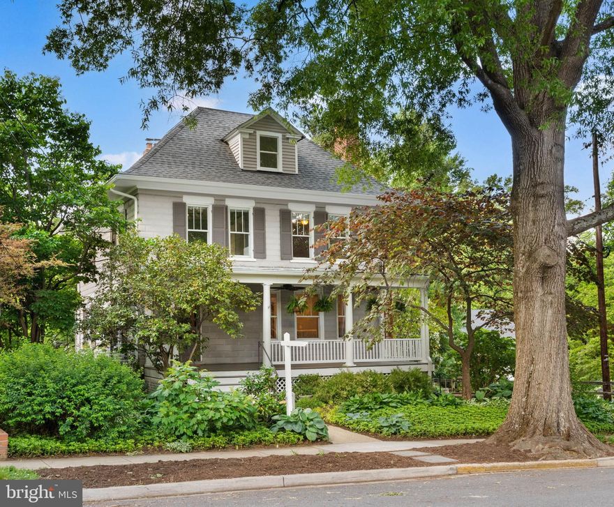 *Open House Sat 5/16 12-3pm & Sun 5/17 12-2pm* Welcome to 3419 Raymond St. in the heart of Chevy Chase, MD — a rare opportunity to own a timeless early-20th-century home in the coveted Martins Addition neighborhood, an inviting enclave known for its tree-lined streets, strong sense of community, and unbeatable location. Situated on a premier block in one of the nation’s most sought-after zip codes, this exceptional property perfectly blends historic charm, modern luxury, privacy, and convenience. Positioned on a quiet, dead-end street and set on a large lot surrounded by beautifully manicured gardens and mature landscaping, the home offers a peaceful residential setting just minutes from everything. Enjoy being less than 5 minutes from Washington, DC, approximately 5–10 minutes to Downtown Bethesda, and only minutes from major commuter routes including the Beltway.

Built in 1911, this classic modified Foursquare seamlessly blends original architectural character with thoughtful modern updates and refined finishes throughout. The home welcomes you with a generous front porch, oversized oak front door, hardwood flooring, pocket doors, two fireplaces, and a stunning wood colonnade with paneled beam detail that elegantly defines the living spaces while maintaining an open and light-filled flow. Rich in craftsmanship and period detail, the home offers warmth, sophistication, and timeless appeal rarely found today.

At the center of the home is a beautifully renovated 2024 kitchen by Karl Construction that perfectly balances classic design with modern performance. Anchored by a striking custom range wall with paneled hood and pot filler, the space features crisp shaker-style cabinetry extending to the ceiling, marble countertops, full-height marble backsplash, professional-grade appliances, brass fixtures and gallery rails, and a thoughtfully curated blend of painted upper cabinetry with warm natural wood lower cabinetry for added depth and character. A charming vintage-style ironstone sink serves as a focal point along the secondary wall, while integrated appliances and additional marble surfaces maintain a cohesive and elevated design throughout. One of the kitchen’s standout features is the custom pantry concealed behind divided-light French wood doors with dark metal hardware, offering exceptional storage while adding architectural interest. 

Additional updates and improvements throughout the home provide both comfort and peace of mind, including new kitchen appliances in 2024, hot water heater in 2016, new boiler in 2022, roof and gutters replaced in 2019, upper AC in 2023, lower AC in 2022, and both chimneys and fireboxes completely rebuilt in 2024. The home also features a recently fully finished attic and a beautifully remodeled primary suite experience, including a luxurious primary bathroom, custom walk-in closet, and private screened porch retreat directly off the suite.

This is a truly special offering that combines the charm and architectural integrity of a historic Chevy Chase home with the high-end updates and functionality today’s buyers are seeking — all in an unbeatable Martins Addition location close to DC, Bethesda, parks, dining, shopping, and commuter access.