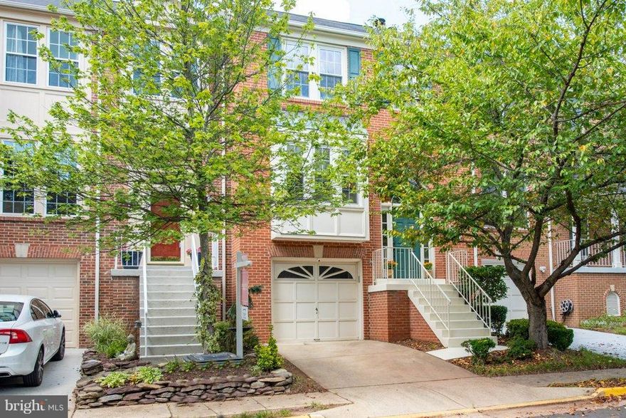 A MUST SEE -  Renovated modern kitchen with custom island + quartz countertops Brand new Hardwood in kitchen, dining room and foyer Custom Elfa Systems in ALL Bedroom closets LARGE and LUXURIOUS Master Suite with walk-in closet. Master Bath with Dual vanities and a separate shower and bath Enjoy the cozy rec room with gas fireplace.  Brand new deck.