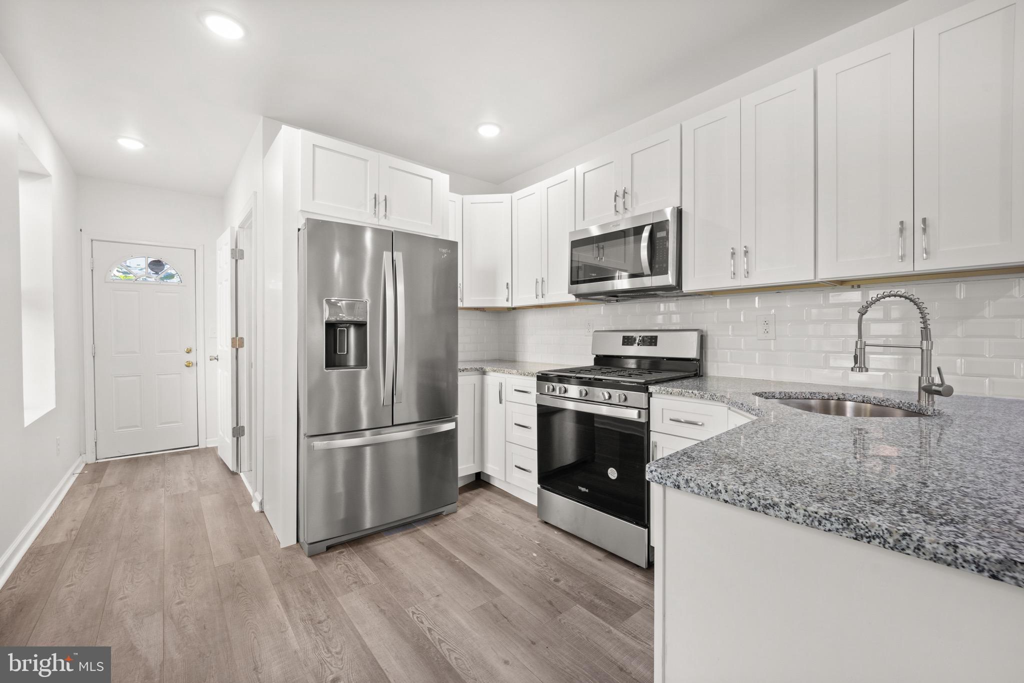 Welcome to your beautifully renovated 3 story dream home. This gem features 4 bedrooms, 2 full baths, 2 1/2 baths, a finished basement, and ample space for comfortable living. The spacious and open first floor encompasses a large living room, high ceilings, eat in kitchen, and a convenient half bath.  The updated kitchen features modern appliances and plenty of counter space to prepare your favorite meals.  Step outside to create your private oasis with a nicely sized backyard perfect for barbecuing and enjoying sunny days.  This convenient location makes commuting a breeze with close proximity to I76 and public transportation. Don't miss the opportunity to make this your forever home!