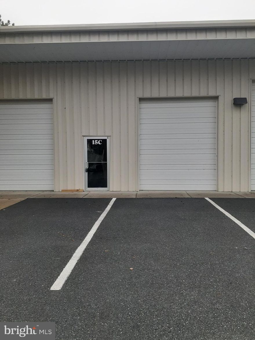 Rare opportunity to own this convenient West OC conditioned commercial warehouse condo with low fees. Approximately 1,000 sq ft of space with a  half bath and already plumbed for easy installation of a shower, if desired. Upgraded LED lighting, HVAC and oversized garage door provides many options for this space.