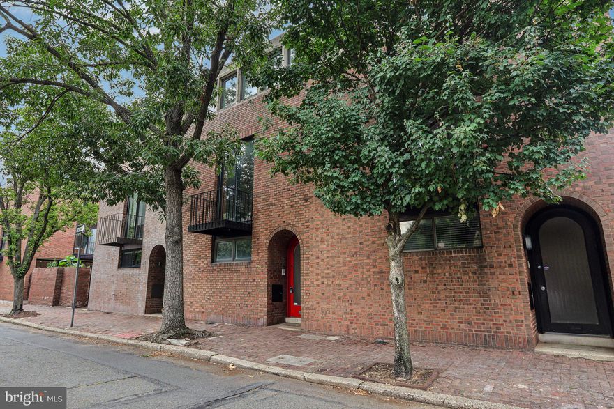 Spacious 3 bedroom, 3.5 bath home with secure PARKING, nestled in the coveted Society Hill neighborhood.  Highly desirable I. M. Pei Mid Century Modern Architect design with newly finished hardwood floors, newer double paned windows,  10+ft ceilings, and an exquisite center spiral staircase. The main level features a walk-through kitchen with ample cabinetry, double ovens, and a bright dining room with sliding glass doors leading to your private patio oasis. The second floor offers expansive living rooms with high ceilings and a hallway full bath with tiled surround. On the third floor, you'll find 3 sizable bedrooms, including an expansive primary bedroom with a full wall of closets and an ensuite bath. The partially finished lower level provides additional living space and ample storage, along with a laundry area.  This prime location offers easy access to some of the best restaurants and shops in Philadelphia, as well as sought-after attractions such as Spruce Street Harbor Park and Headhouse Square. The nearby I-95 Cap Project is under construction now. A $329 million dollar park project which will connect Center City to the waterfront and an 11.5 acre park featuring green space, play area, RiverRink, a cafe and more.