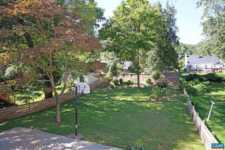 Available June 11th - This charming 4 bedroom, 2 bath home is nestled within the desirable Fry's Spring community and is ideally located minutes from the University of Virginia grounds and Medical Center, downtown Charlottesville, and 5th Street Station. Enjoy the convenience of I-64 access and a nearby city bus route just minutes away.  Step inside the 1,366 sqft home to find hardwood floors leading you into a comfortable living room and a modern kitchen. The kitchen features granite countertops, stainless steel appliances, and ceramic tile flooring. Two main-level bedrooms and a full bathroom complete this floor. Upstairs, consists of two additional bedrooms, each equipped with window AC units. The partially finished basement expands your living space with an LVP-floored family room (not pictured), a full bathroom, and an unfinished storage/laundry/workshop area. A full-size washer and dryer are provided. Step outside to a large, fenced yard featuring a patio and garden space, perfect for outdoor enjoyment. Convenient on-street parking is available, and the home is pre-wired for Ting fiber internet.  Resident is responsible for the lawn care and all utilities. One dog (50lbs max) is allowed with additional fees. No cats.