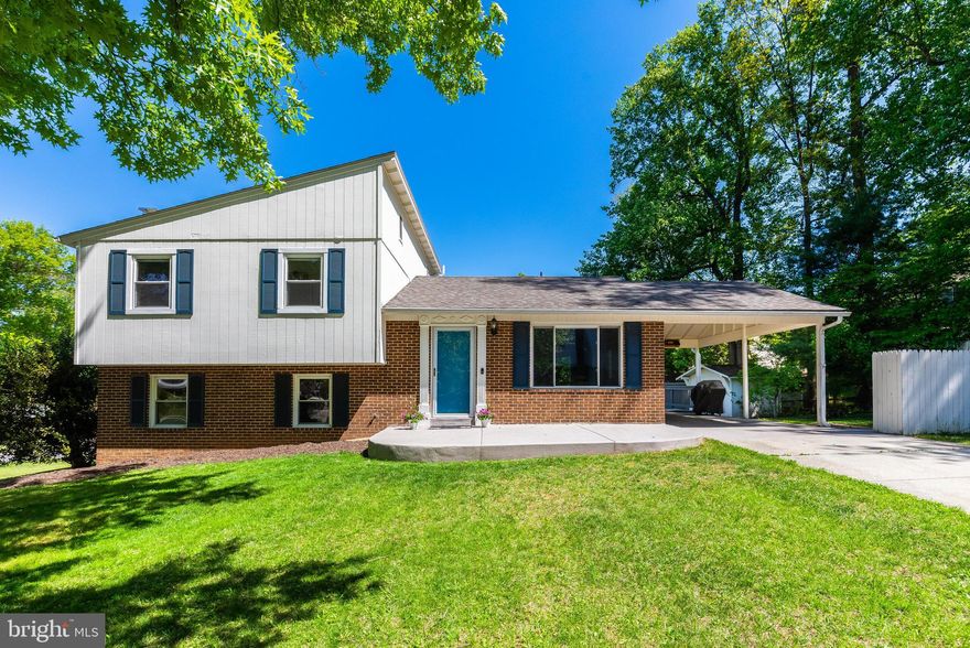 Welcome to 13201 Wilton Oaks Drive—a beautifully updated 4-bedroom, 3-bath home tucked at the end of a quiet cul-de-sac and backing to serene county parkland. Situated on a spacious 10,919 sq ft corner lot, this move-in ready property offers the perfect blend of privacy, modern updates, flexible living space, and commuter convenience.
Designed for today’s lifestyle, the light-filled interior features an open-concept floor plan with seamless flow between the living room, dining area, and fully renovated kitchen—ideal for both everyday living and entertaining. The stylish kitchen showcases white shaker cabinets, quartz countertops, stainless steel appliances, designer tile backsplash, center island, and built-in wine fridge. Hardwood floors throughout the main and upper levels add warmth and timeless appeal.
Upstairs, the spacious primary suite with en suite bath is complemented by two additional bedrooms and a renovated hall bath. The versatile lower level includes a large family room with fireplace plus a private fourth bedroom with en suite bath and separate entrance—perfect for an in-law suite, au pair suite, guest space, or home office. An additional lower-level recreation area and dedicated laundry room provide flexible space for a home gym, media room, or playroom.
Outdoor living is equally impressive with a spacious deck, tree-lined backyard, storage shed, and covered carport—offering exceptional space for relaxing, entertaining, and everyday convenience.
Located just one mile from Glenmont Metro Station, this home provides easy access to Washington, DC, Georgia Avenue, I-495, and the ICC, making it ideal for commuters. Enjoy nearby outdoor destinations including Wheaton Regional Park, Brookside Gardens, Brookside Nature Center, and Rock Creek Park.
Rarely available, this home combines a sought-after cul-de-sac location, parkland views, updated interiors, flexible multi-generational living options, and Metro accessibility—an exceptional opportunity in a prime Silver Spring location.