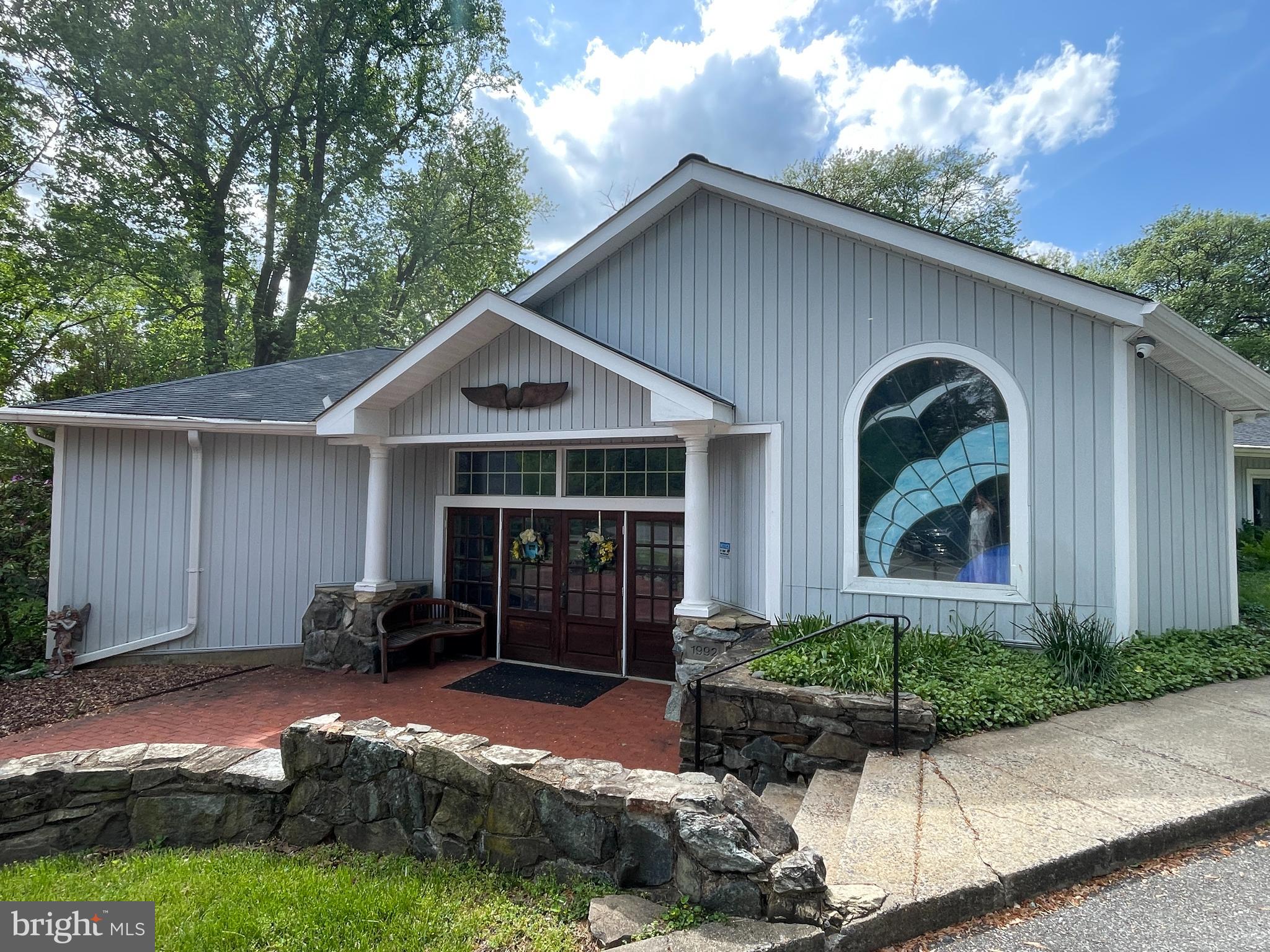Available Mon-Sat, plus most Sundays after 3pm. A spacious and versatile sanctuary building located on a quiet, well-maintained church campus. This space is ideal for church congregations, community organizations, performing arts groups, wellness collectives, or event-based nonprofits in need of a large, flexible gathering space. This space will be used on Sundays till 2:30pm by the Unity Church of Gaithersburg, but all other days & Sunday after 2:30p are available for rent.<p><p>
The sanctuary (approx 2000 sq ft) is perfect for worship services, concerts, workshops, or lectures. High ceilings and flexible seating options create a welcoming environment. The Peace Room (approx 600 sq ft) is a smaller, serene space for meetings, small groups, meditation, or childcare. The lobby area is bright and inviting, ideal for welcoming guests and setting up informational displays or refreshments. The kitchen is fully equipped for meal prep or event catering needs. Restrooms are clean and accessible for guests and staff. Drum set and audio equipment are not for tenant's use. Please bring your own. <p><p>
Minimum 2 day use with preference for long-term and frequent use. Base rental prices:
$1400/month – 2 days per week
$2100/month - 3 days per week
$2800/month - 4 days per week
$3500/month - 5 days per week
$4200/month – 6 days per week
Rent includes ALL UTILITIES + WIFI. Rental prices subject to change based on tenant's group size and usage.
Whether you're seeking a dedicated home for your growing congregation, a regular venue for community events, or a large space for hosting programs and performances, this sanctuary building offers flexibility, affordability, and comfort. The building is situated on a shared campus with other professional buildings (also available for lease), with ample parking and a lush setting.<p><p>
Call today to schedule a showing!