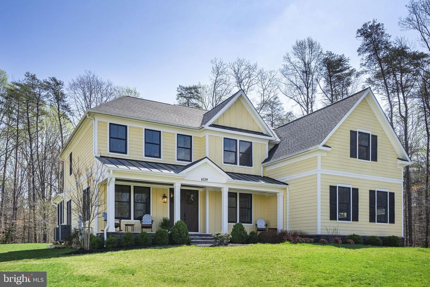 Welcome to 6539 Foxhollow Lane in Fairfax Station. Nestled in the highly sought-after Park View Estates community, this stunning custom-built home, completed in 2020, offers  almost 6,000 square feet of luxurious living space on a 1.04-acre lot, backing directly onto the picturesque Burke Lake Park. Spanning over 888 acres, Burke Lake Park boasts a 218-acre lake, a scenic 4.7-mile trail, and a wide array of recreational amenities, including a golf course, fishing, boating, and much more. “When you see this home you will be impressed.  As you approach the home, you’re greeted by a welcoming front porch with a beautiful stone walkway, perfectly framing the serene landscape. The home features a durable Hardi plank exterior, complemented by striking Anderson black windows, and boasts high-end finishes throughout. The screened porch and Trex decking create ideal spaces for outdoor relaxation.
Inside, the expansive 5-bedroom, 5 ½-bathroom layout is designed with comfort and style in mind. The main living areas are adorned with solid hardwood floors, and the chef-inspired kitchen is a showstopper, featuring GE Monogram built-in appliances, quartz countertops, and a spacious walk-in pantry. The kitchen flows seamlessly into the dining and living areas, making this home perfect for both everyday living and entertaining. The private owner's suite is truly a retreat, with a massive 13x12 custom closet and a spa-like bath that includes a double shower, a large freestanding soaking tub, and a stunning 117” double vanity. The large "secret" room over the garage serves as a private sanctuary. Each of the secondary bedrooms is generously sized and includes its own walk-in closet and en-suite bathroom. The fully finished basement offers even more living space, with a guest suite, a large rec/game room, and a media room that’s already wired for a home theater. There’s also ample storage space and a walk-up staircase leading to the backyard.
This home is fully equipped with modern technology, including a whole-home speaker system, pre-wired TV outlets in every room, and a built-in mudroom. The 3-car garage is designed for convenience already wired with plugs for 2 EV vehicles and additional storage. Highly rated schools Fairview Elementry and Robinson Secondary School.  Minutes to the charming town of Clifton.  The future owner will be thrilled with the combination of factors that make this property truly unique, including: Burke Lake as an extension to your back yard, a perfectly situated lot where you can actually see sunrises and sunsets, a secret hideaway, a small group of welcoming and friendly neighbors (one of whom has a private ice skating rink that he shares with his friends), abundant wildlife and more…