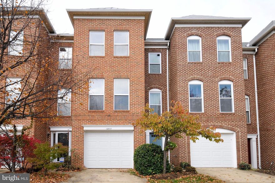 Fresh paint! Ready to move in! Reston Town Center Location! 3-4BR, 3.5BA, 1-car garage. Open floor plan: living room, family room and kitchen leads to deck. Master BR large enough for king bed.  High ceilings, hardwoods, gas fpl, recessed lighting & two decks. Community pool and fitness center. Pets allowed on a case by case basis. Close to shops, restaurants & Trader Joes! Mins to Reston Metro.