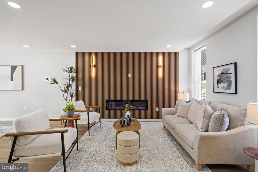 Fully Renovated | 2 Parking Spaces | Designer Finishes | Guest Suite | Oversized Outdoor Living

This is not a typical renovation—this home has been completely rebuilt from the studs up, offering the feel of new construction with carefully curated, high-end design throughout.
The main level features a bright, open-concept layout with seamless flow between the living room, dining area, and kitchen—ideal for both everyday living and entertaining. A custom accent wall with a built-in fireplace creates a striking focal point, while the oversized dining area adds rare functionality. The kitchen is beautifully appointed with quartz countertops, a large island with seating, modern cabinetry, and a **true walk-in pantry**—a standout feature.
Upstairs, you’ll find spacious bedrooms and elegantly finished bathrooms with designer tile and fixtures.
The lower level extends the living space with a **private guest suite and flexible bonus area**, perfect for visitors, a home office, or additional living.
Step outside to an exceptional outdoor setup featuring an **oversized deck, expansive patio, and a large private yard**—creating multiple spaces to relax or entertain. The property also includes an **oversized parking  with two parking spaces**, a rare and highly desirable feature.
Every major component has been replaced—roof, HVAC, plumbing, electrical, roof —offering true peace of mind.
A turn-key home that delivers space, style, and functionality—inside and out.