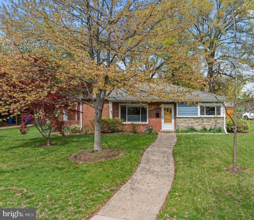 Much larger than it appears, this charming one-level brick Rambler sits on a beautifully landscaped corner lot in sought-after University Park.  Ideal as a starter home or for those looking to downsize and age in place, this well-maintained residence offers comfort, convenience, and stylish updates throughout.  Step into a cozy living room with beamed ceiling featuring a fireplace, built-in shelving and ample storage.  The adjoining dining area provides access to a side patio and driveway, as well as the renovated kitchen - complete with stainless steel appliances, glass-front cabinetry, a breakfast bar, double sink, electric range and ceramic tile flooring,  A utility room extension adds additional counter space and includes a wine refrigerator, perfect for entertaining.  The rear mudroom offers front and back outdoor access and leads to a newly carpeted family room with a separate entrance - ideal for a home office, guest suite, or media room.  A separate laundry room features a stackable washer/dryer, utility sink and built-in cabinetry, with direct access to the one-car, front-load garage.  On and off street parking provide plenty of space for your guests. Enjoy spring blooms in the fully fenced backyard with patio with stone capped wall, flagstone walkway and storage shed.  Additional features include central air, gas heat, six-panel doors, replacement windows, laminate flooring (over parquet) and window treatments throughout. This is a one-of-a-kind opportunity.