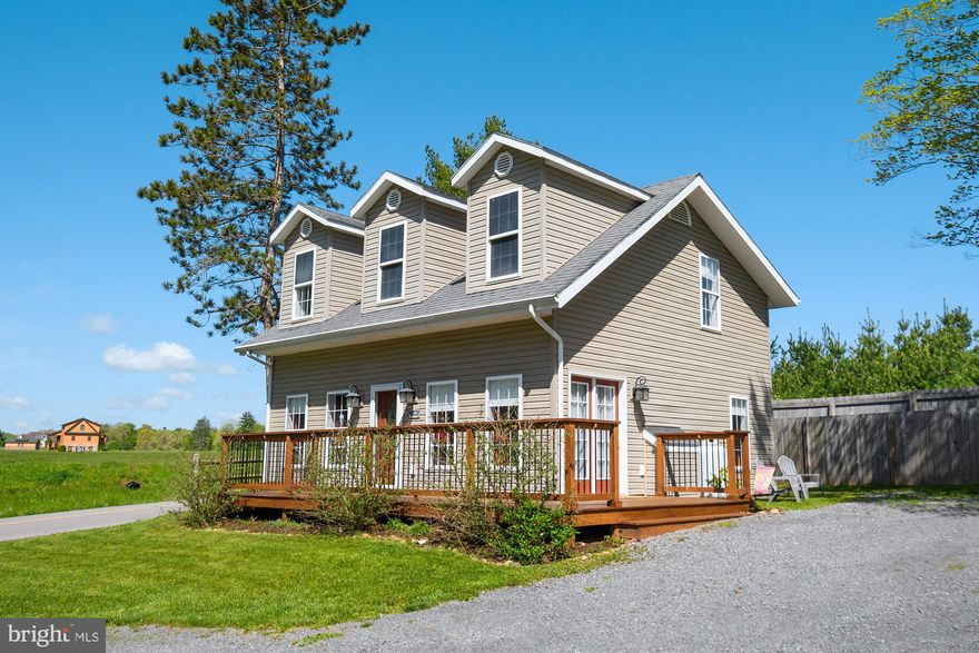 Quaint & cozy cottage near the shores of Deep Creek Lake, and close to the DCL State Park. The home offers three bedrooms (one of them being a large loft bedroom) and an open floorplan. The living room boasts a lovely stone, gas burning fireplace and cathedral ceilings. It feels very warm and inviting from the moment you walk in. The exterior space is just as nice, offering a large deck and a fire pit area to enjoy with family and friends. Call today to preview!