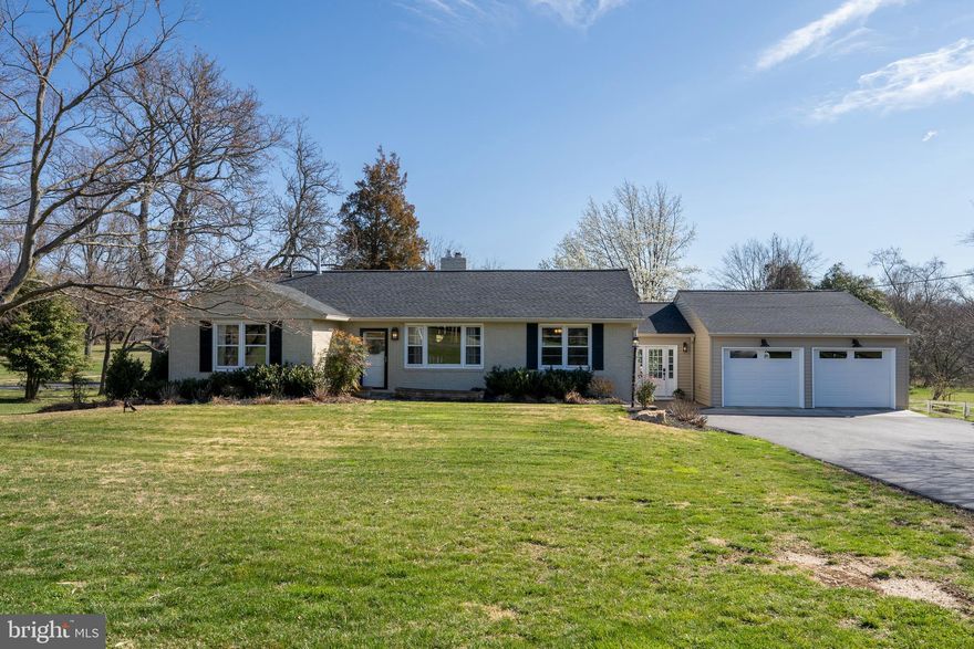 So peaceful! Beautiful 1 acre Greenspring Ave rancher close to Caves Rd. This 4 + 3 home is SERIOUSLY updated! Brand new driveway, roof, recent patio and covered porch, finished breezeway/mudroom, GIANT storage/finished workshop behind true 2 car garage,  separate primary suite, beautiful hardwoods and LVP throughout, kitchen and baths with granite, paint, and trim all on trend. HUGE finished lower level with plenty of space to spread out with separate working, living, storage, and sleeping areas. This house has it all!