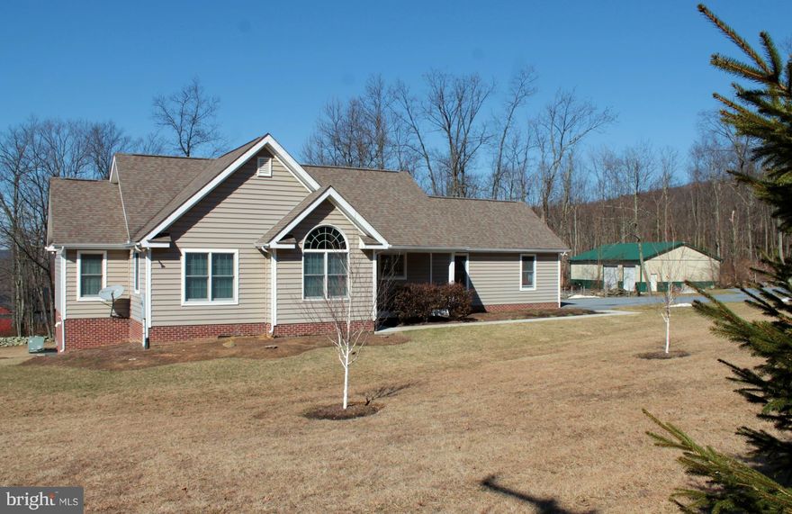 custom built home on 3.30-acres w/separate 3.53-ac building lot available. 40x48 Out-building w/200 amp elec, overhead doors, HVAC & water. Home is 2x6 construction. Central vac, tankless hot water heater, CAT5 wiring. Finished bsmt w/3rd full bath & office or 4th bedroom. Kit w/hickory cabinets. Master-suite w/private bath & walk-in closet. Bedrm 2 w/cathedral ceiling. House  generator equipped.