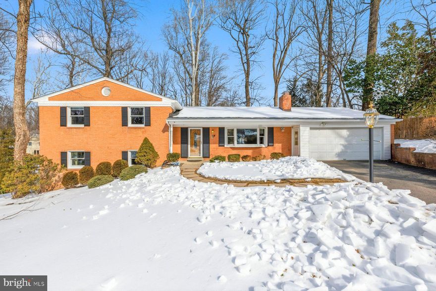 MUST SEE.  Don't miss this Beautifully remodeled 4 bed, 2.5 bath 4 level home on over a half acre lot.  Cul de sac location, 2 car oversize garage, brick home with hardwood floors.  Walk in to the remodeled main level great room with an amazing gourmet kitchen with SS appliances, gas cooking,  quartz counter tops, large island with seating.  Enjoy the spacious living area with a huge bay window and fireplace.  The Main level  open concept great room includes  plenty of space for dining.  Walk out to one of two patios overlooking the huge backyard.  Special features include a storage shed in the huge backyard, a generator, lower level private bedroom with attached half bath, family room with sliding doors to additional patio and backyard, laundry room with front load washer and dryer and an additional exterior door.  The Fourth level provides a large storage area or make it another living space.  The Upper level includes a large main bedroom with ensuite bath, two additional bedrooms and the second full bath.  Hardwoods throughout the main, lower, and upper levels.  All bathrooms have been remodeled, windows have been replaced, roof replaced, all appliances have been replaced.