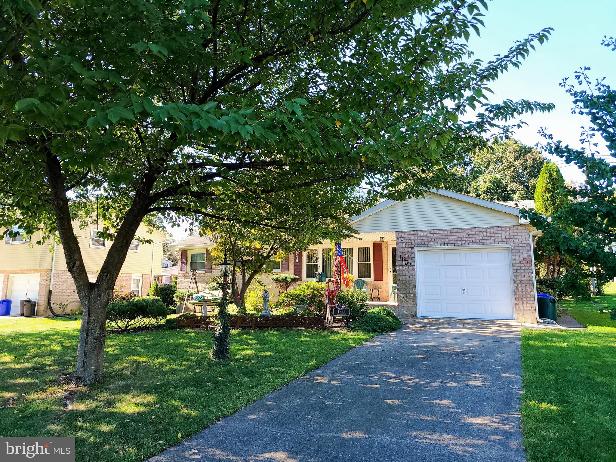 Fantastic one floor living in a convenient location! Beautiful lot with lovely outside gas firepit and patio area. 3 spacious bedrooms primary suite with private 1/2 bath. Schedule your showing today!