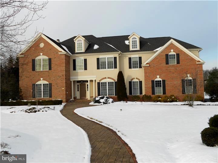 Bright and Beautiful home in desirable location. Hardwood floors and neutral decor invite you to move right in. Traditional first floor living and dining room followed by a home office leading to an open family room and kitchen. Custom window treatments in the family room give ease of light control throughout the seasons. Cherry cabinets, granite counters with bar sink area compliment the spacious kitchen. Master bedroom suite with extra large walk in closet/dressing area and private bath. Two additional full baths on second level and walk-in closet in second bedroom. Finished walk-out basement with extra high ceilings, bathroom and tons of storage space. This home is positioned on a lot to maximize light and secluded views of professionally landscaped yard with paver patio and pergola. Many other nice features to this pristine home such as lights, ceiling fans, garage floor, water treatment system and bath fixtures. Centrally located to schools, shopping, and major roadways.